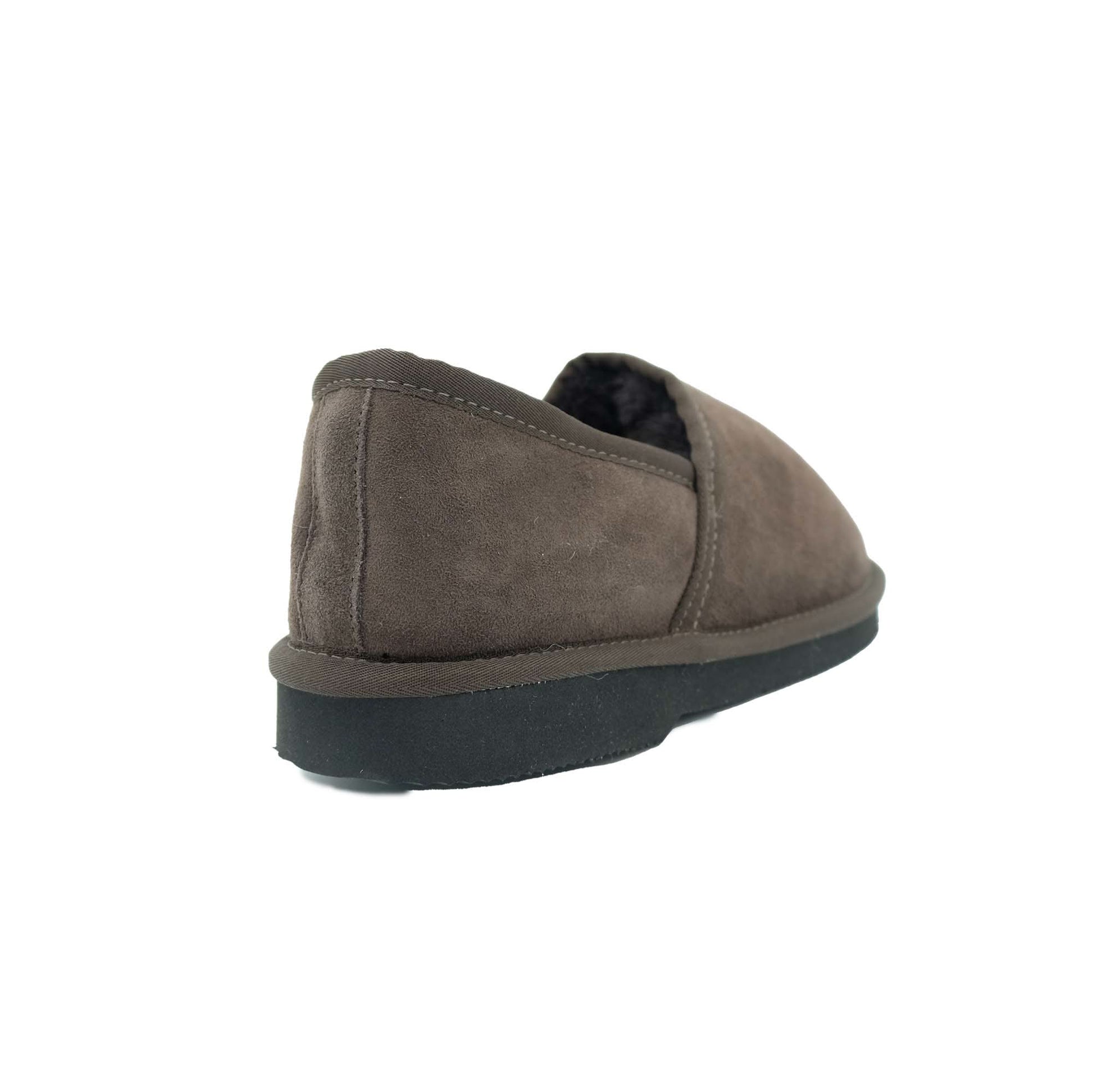 Grey suede sheepskin slipper with black sole, rear view angle. - Yellow Earth Australia