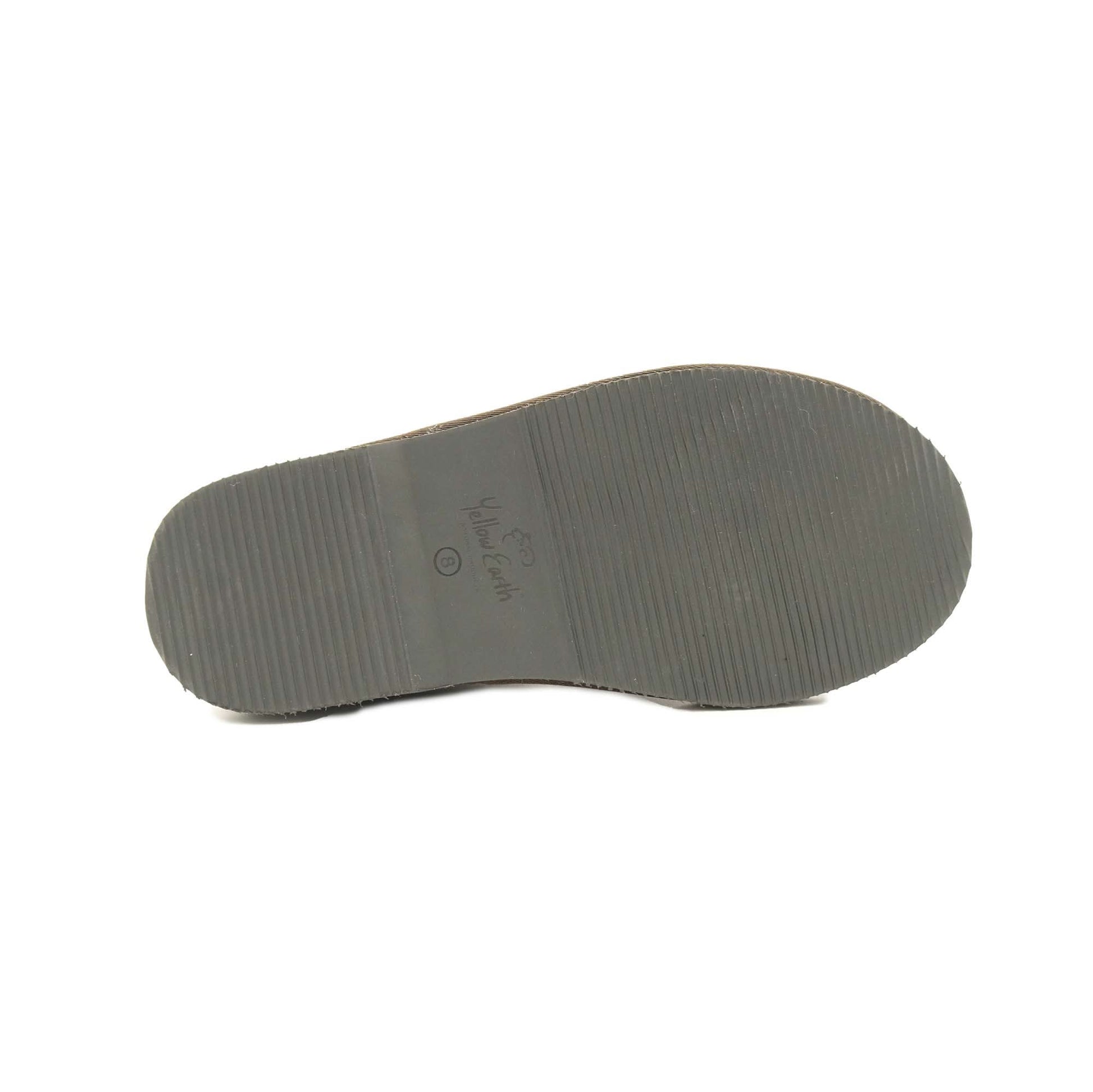 Grey ribbed sole of sheepskin slipper viewed from underneath angle. - Yellow Earth Australia