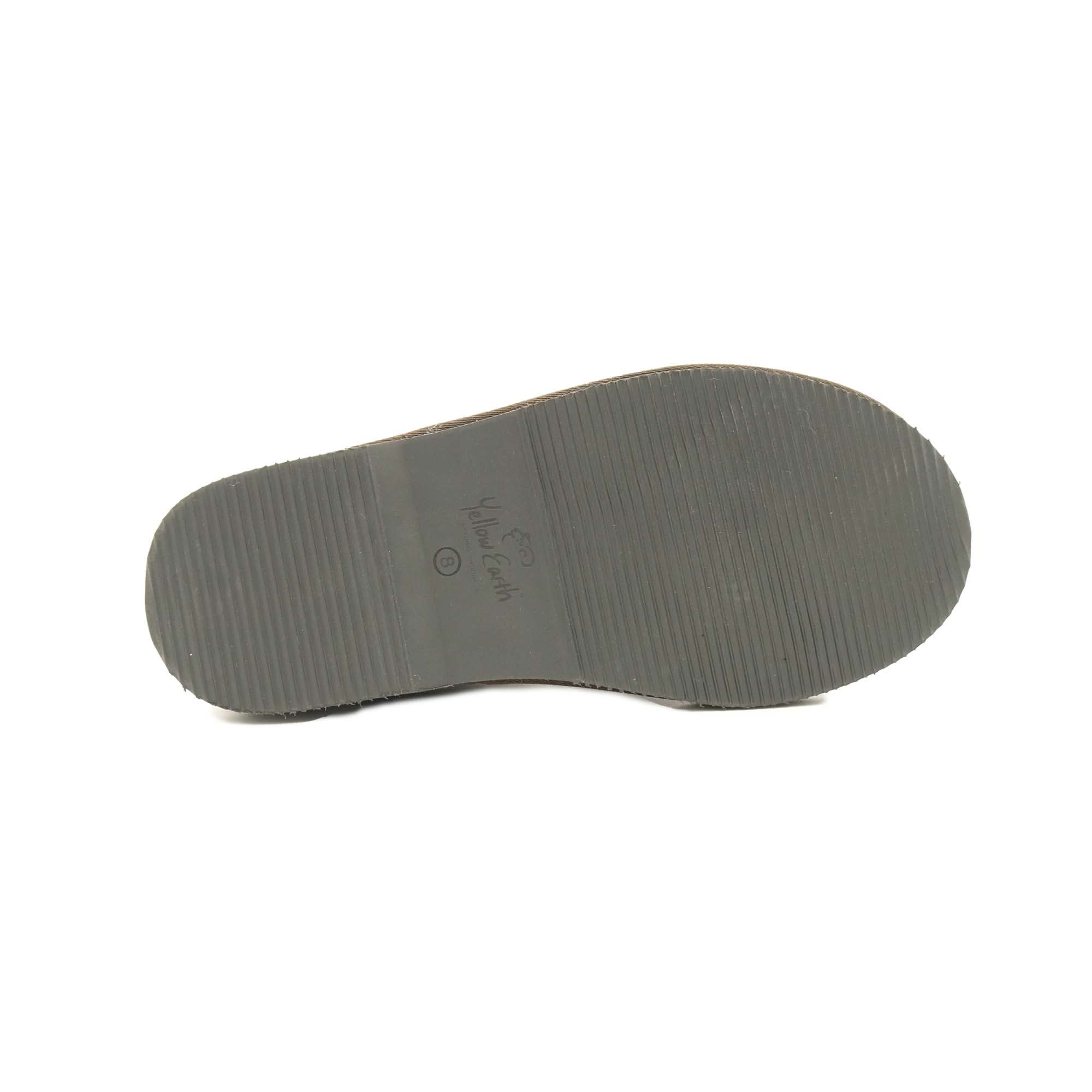 Grey ribbed sole of sheepskin slipper viewed from underneath angle. - Yellow Earth Australia