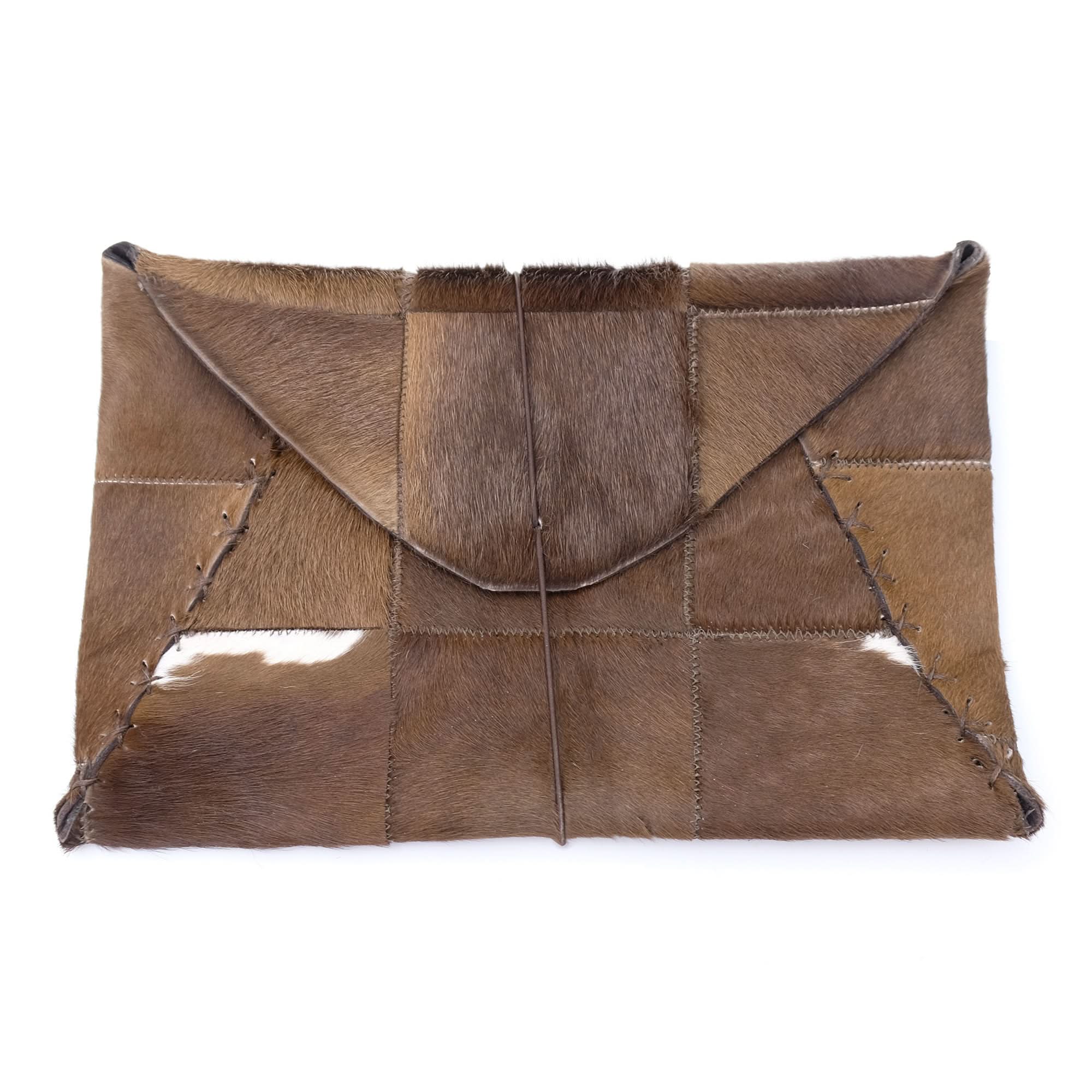 Brown patchwork sheepskin clutch with natural fur texture, top view. - Yellow Earth Australia