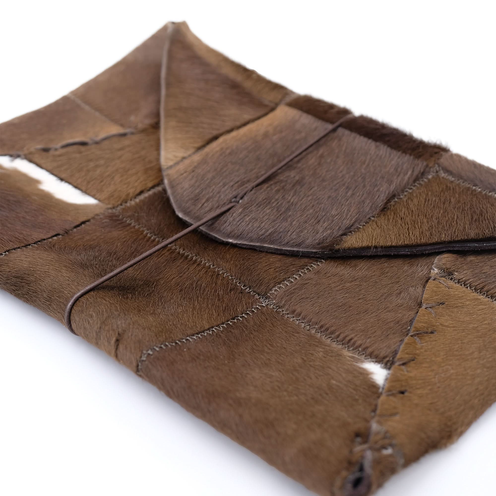 Brown patchwork sheepskin wallet with visible fur texture and stitching detail. - Yellow Earth Australia
