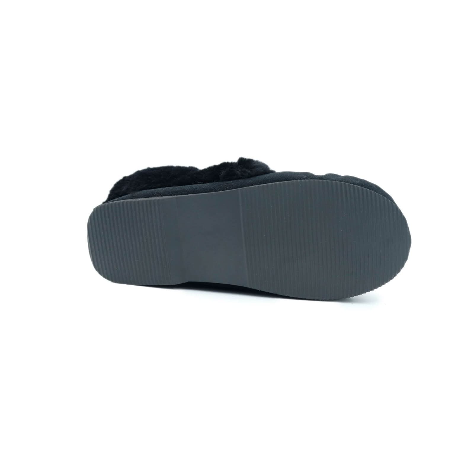Black sheepskin boot with fluffy wool lining, sole view. - Yellow Earth Australia