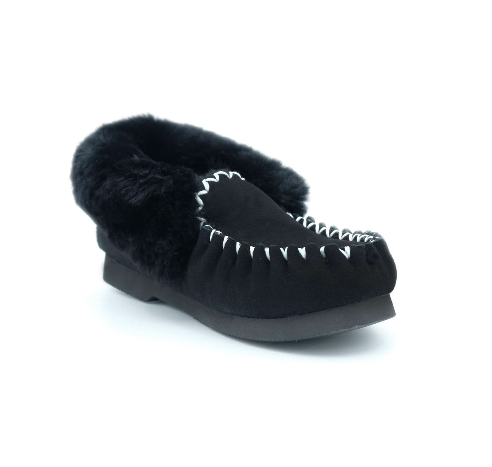 Black sheepskin moccasin with fur trim and stitched detail, side view. - Yellow Earth Australia