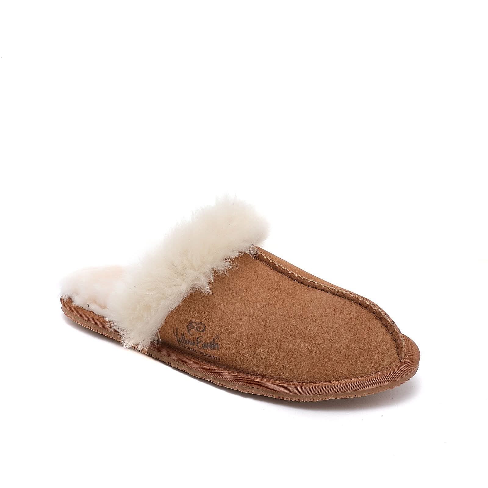 Tan suede slipper with white sheepskin fur cuff, angled side view. - Yellow Earth Australia