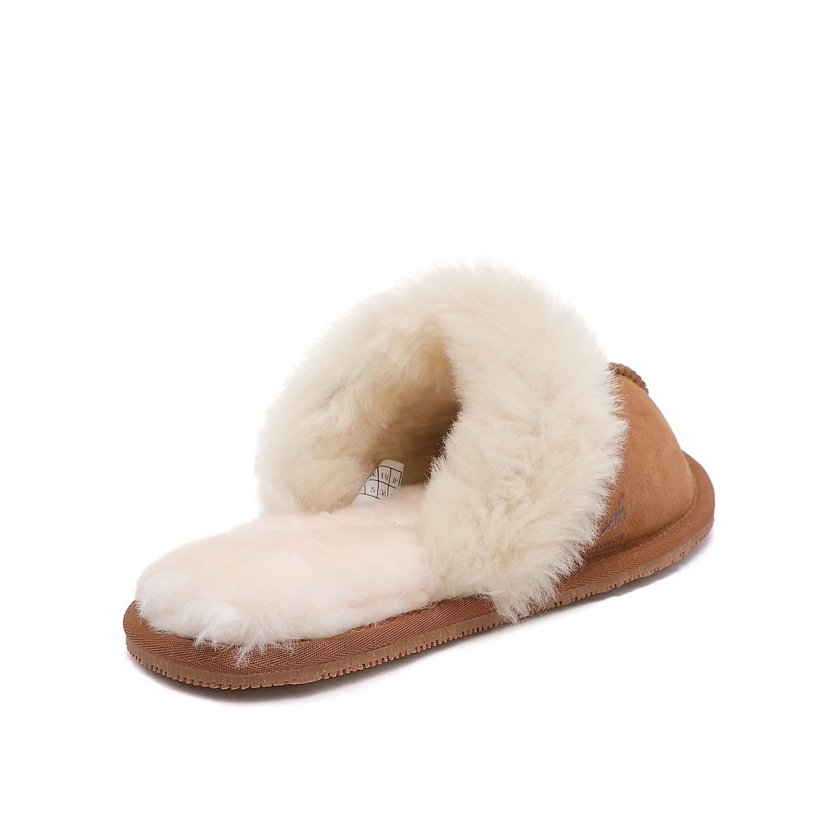 Cream sheepskin slipper with tan suede sole, angled side view. - Yellow Earth Australia