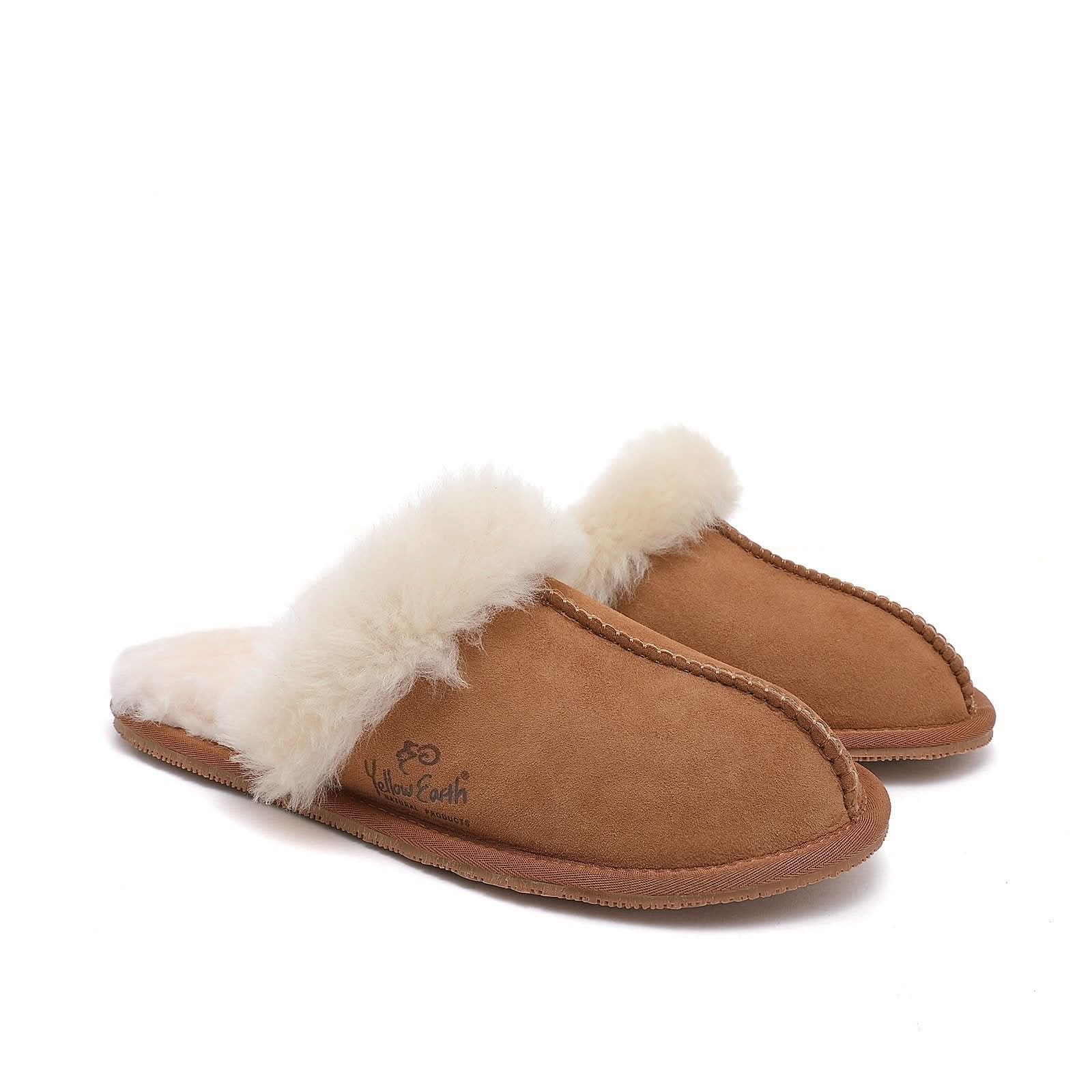 Tan suede slippers with white fluffy sheepskin collar, angled side view. - Yellow Earth Australia