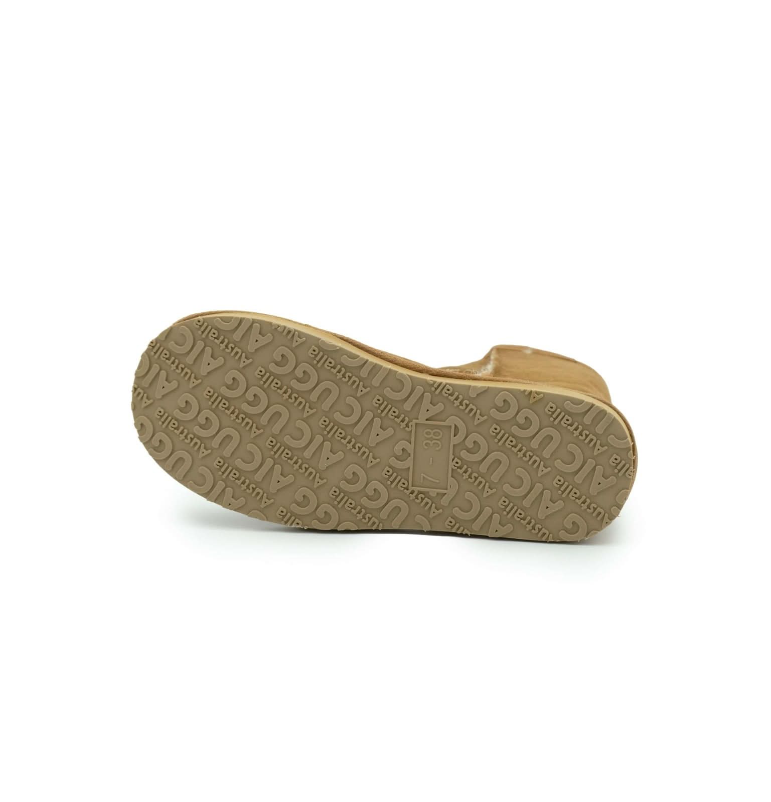 Tan sheepskin slipper sole showing textured tread pattern and natural wool lining from above. - Yellow Earth Australia