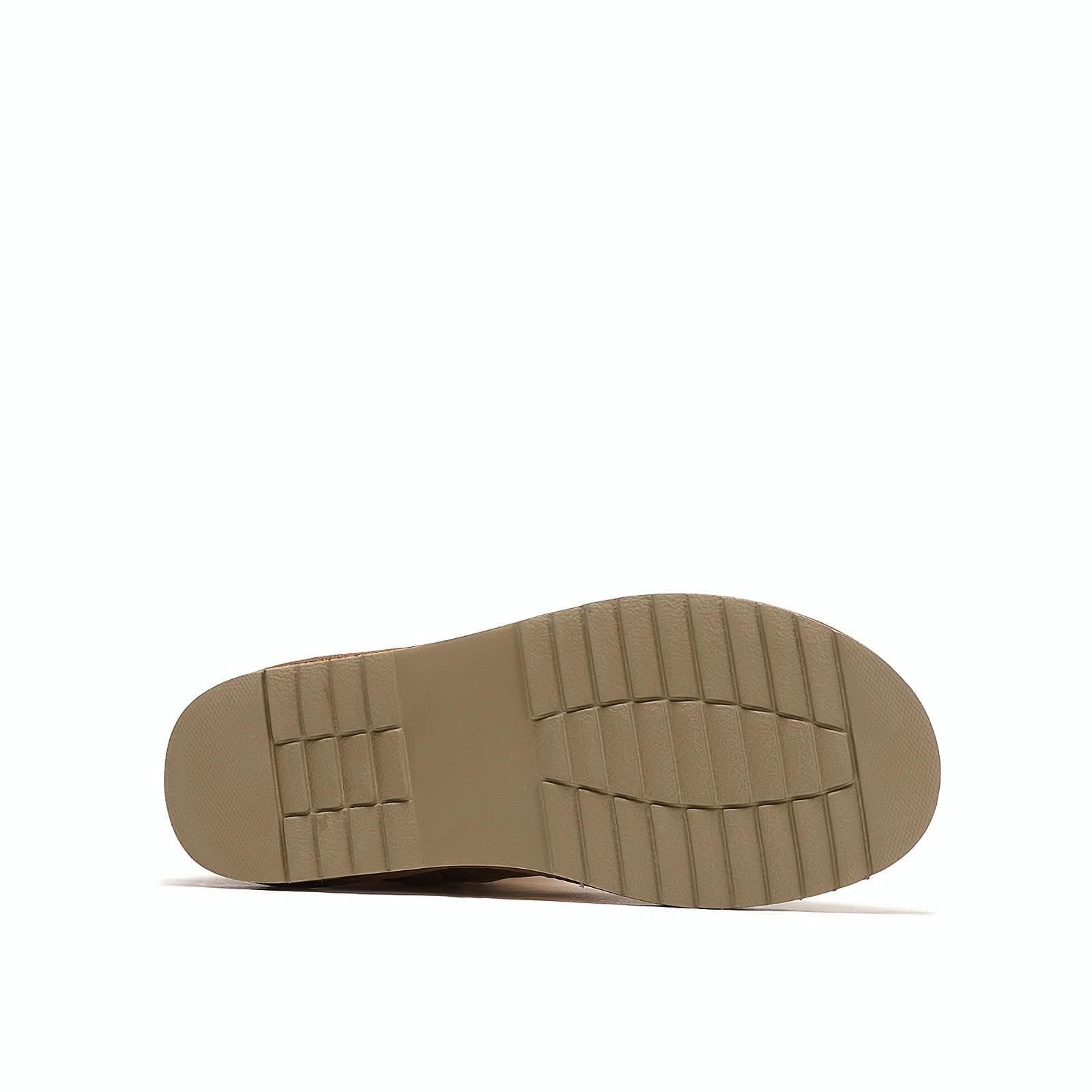 Beige crepe sole for sheepskin boot shown from bottom angle view. - Yellow Earth Australia