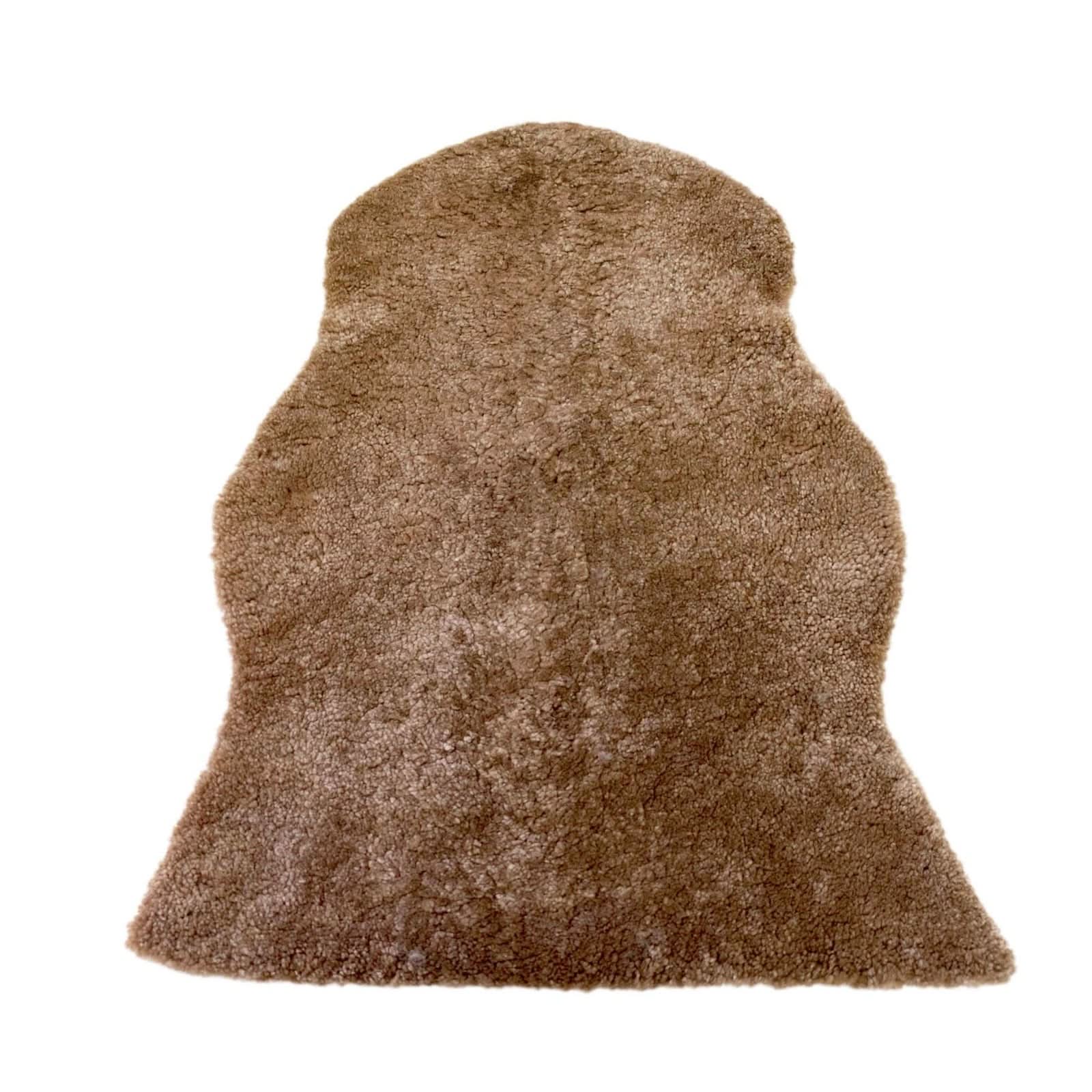 Sheepskin rug in caramel brown displayed flat from above on white background. - Yellow Earth Australia