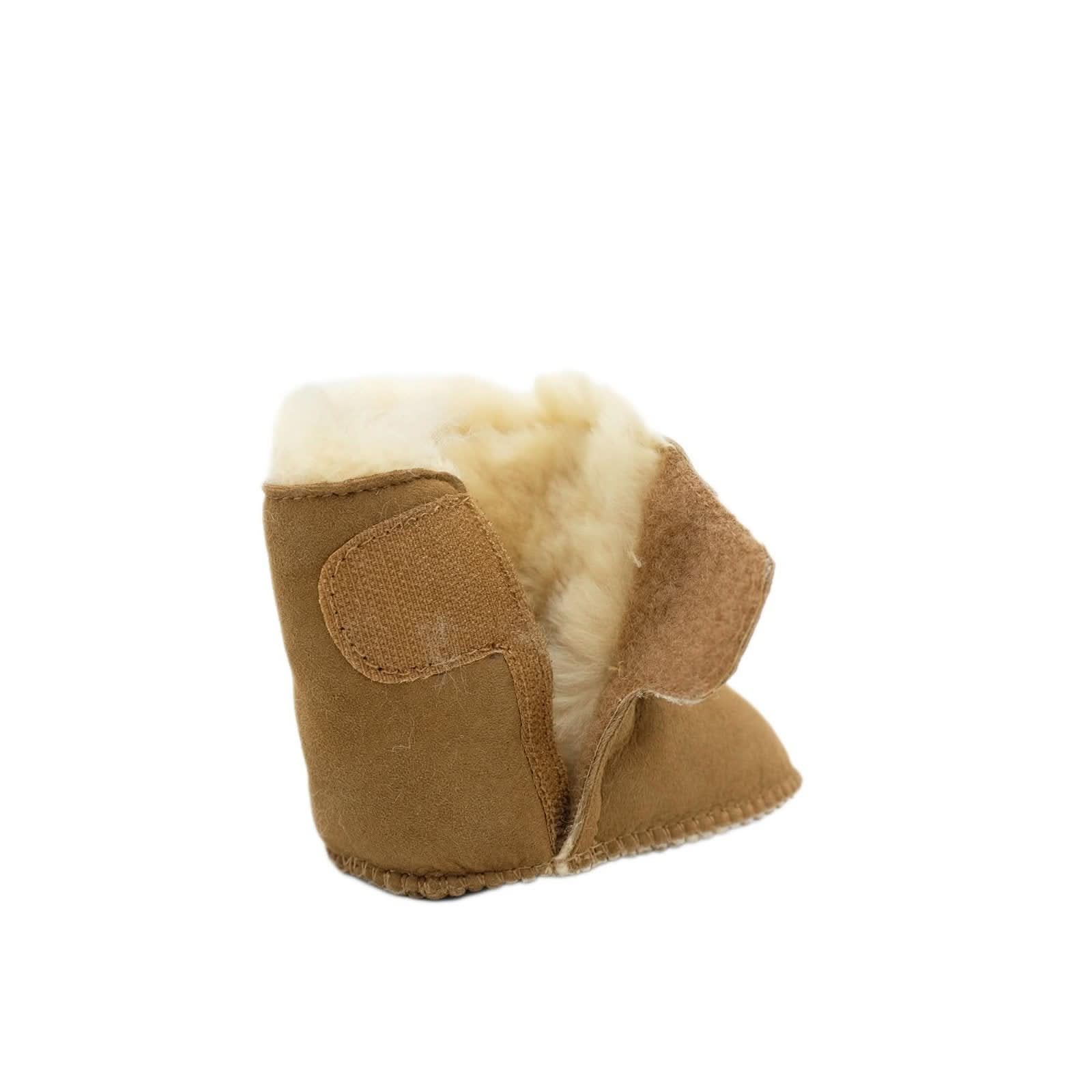 Tan sheepskin baby booties with cream wool lining, side view. - Yellow Earth Australia