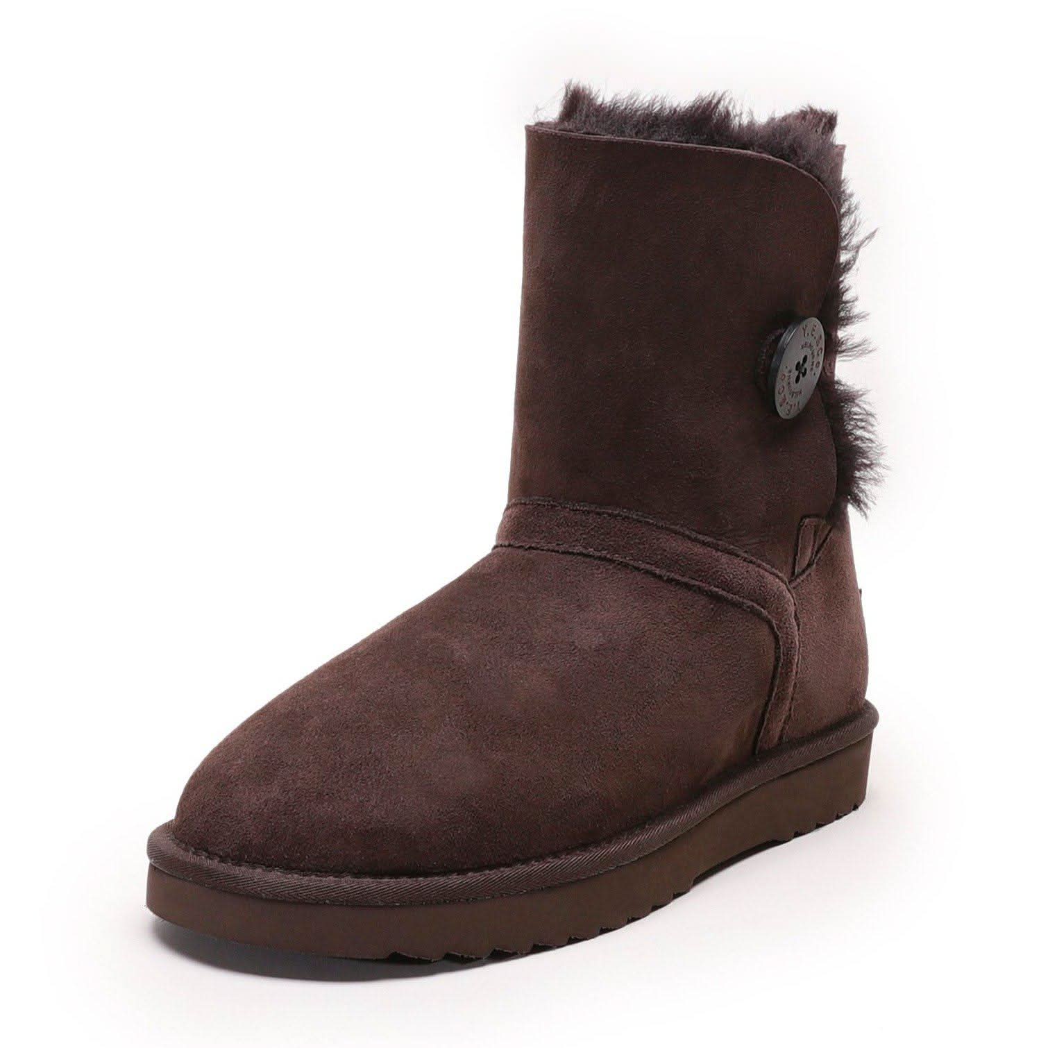 Brown sheepskin boot with wool lining and button detail, side view. - Yellow Earth Australia