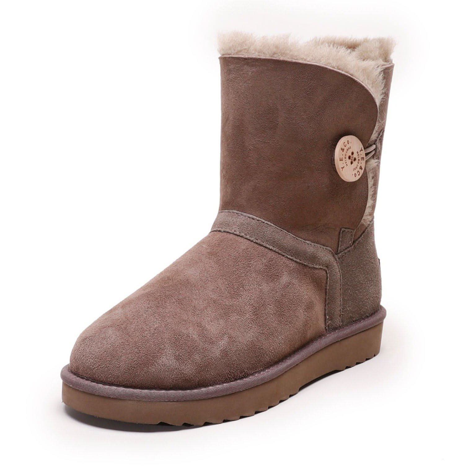 Brown sheepskin boot with fleece lining and button detail, side view. - Yellow Earth Australia