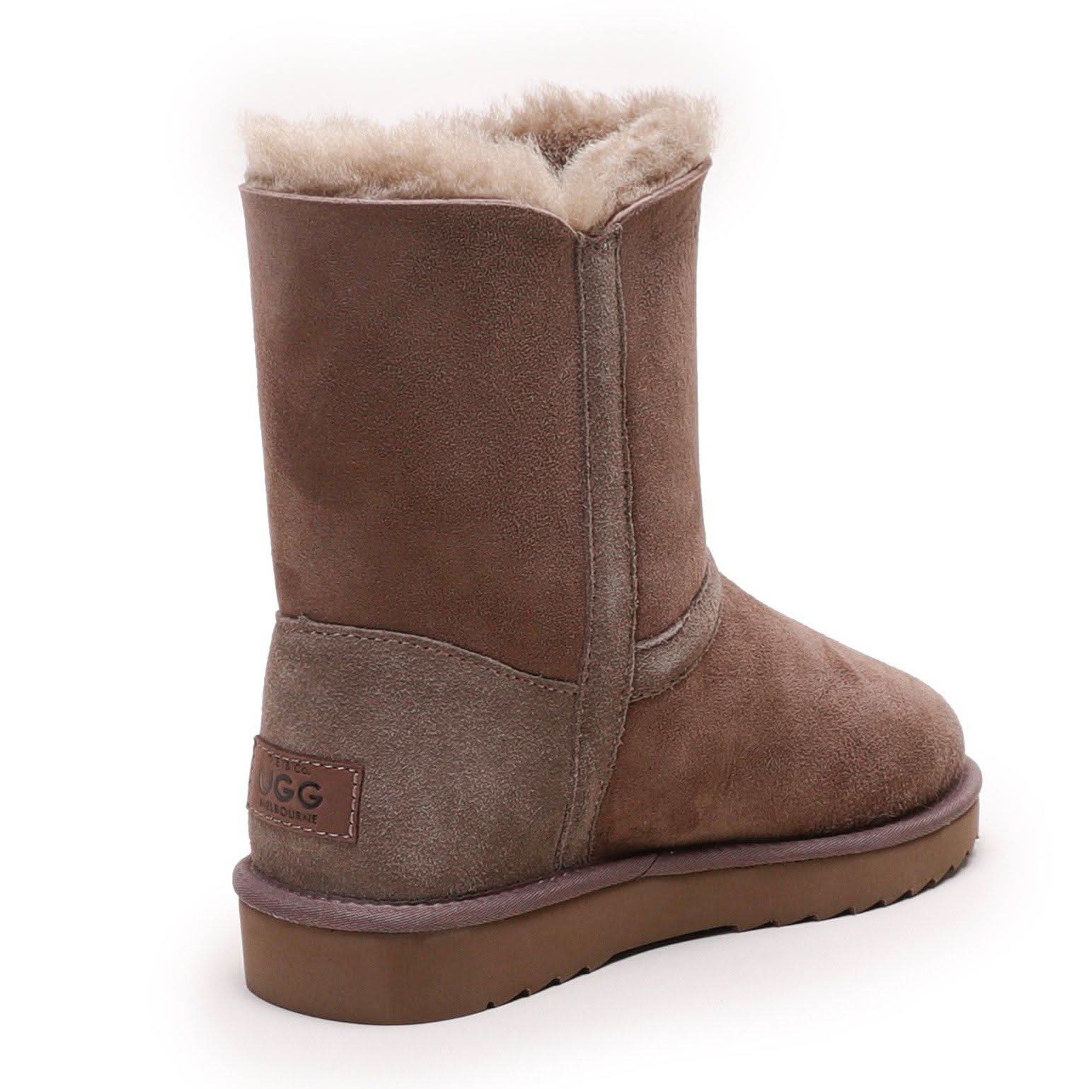 Brown sheepskin boot with fluffy wool lining, rear three-quarter view. - Yellow Earth Australia
