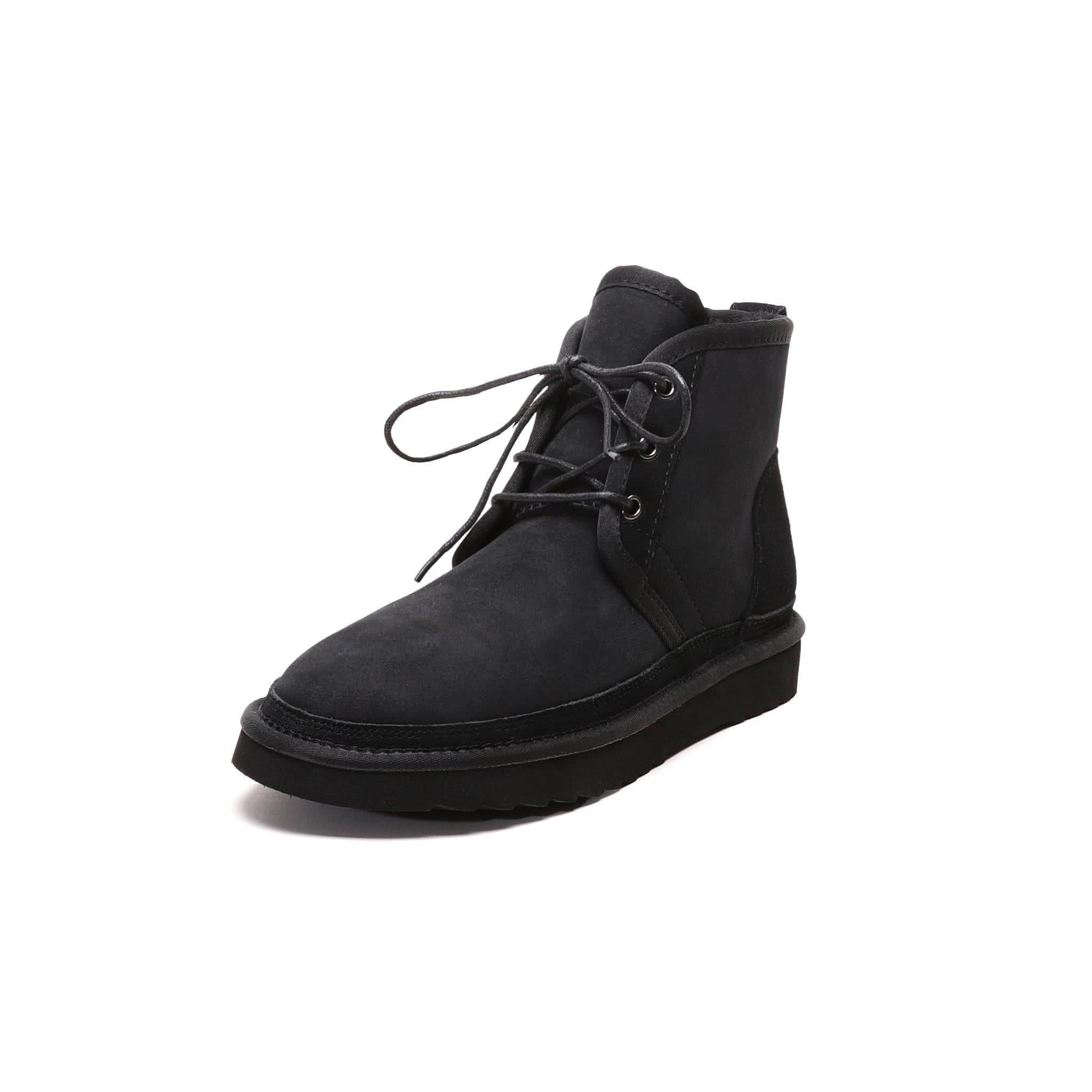 Black lace-up sheepskin ankle boot with thick sole, angled front view. - Yellow Earth Australia