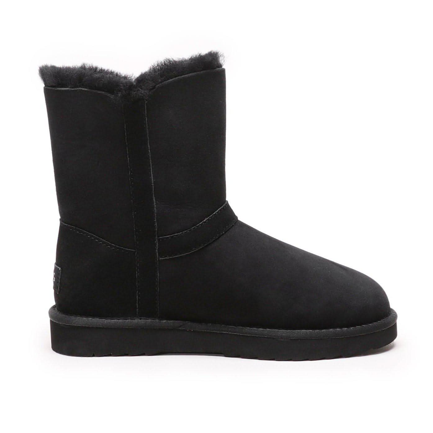 Black sheepskin mid-calf boot with fluffy wool lining, side view. - Yellow Earth Australia