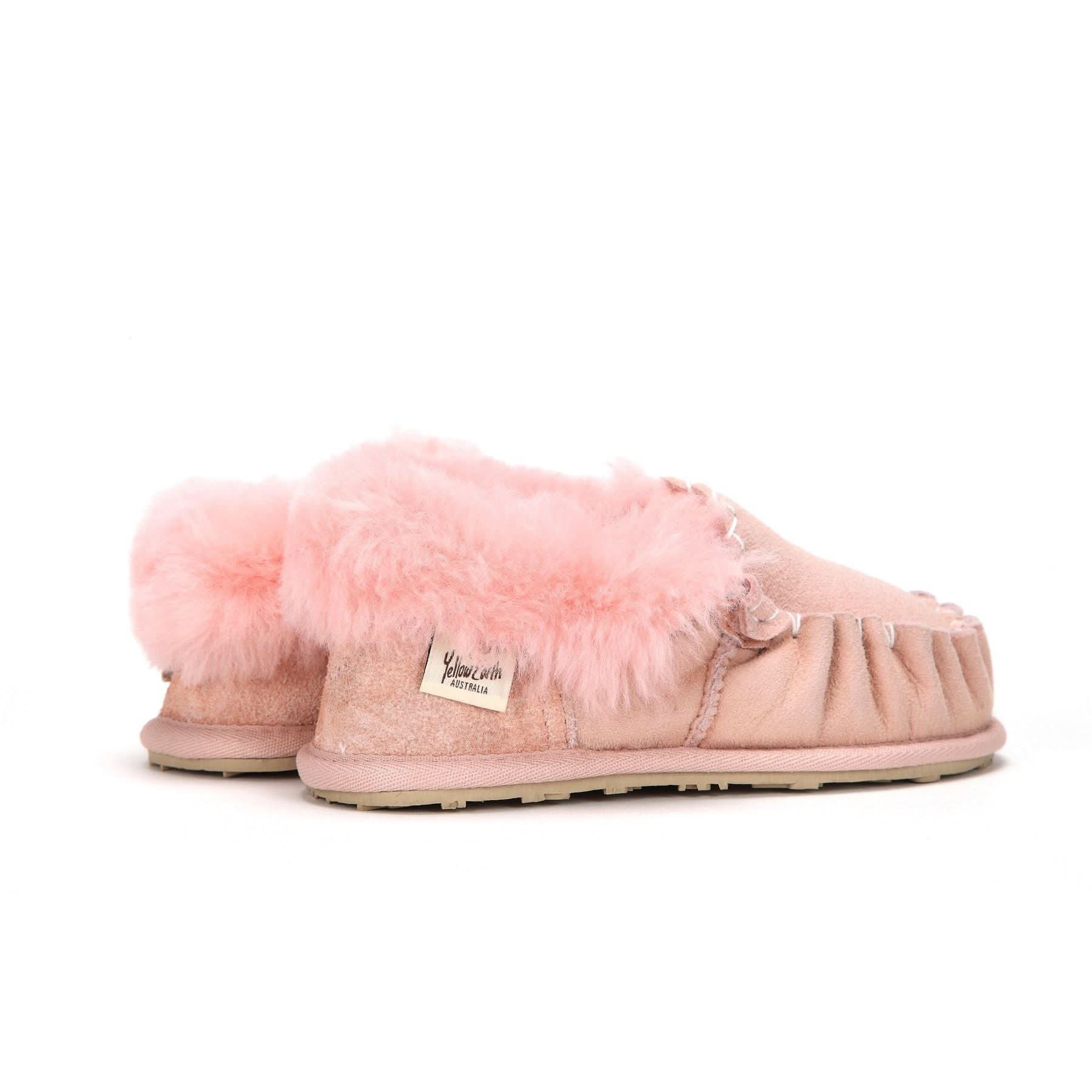 Pink fluffy sheepskin moccasin slippers shown from the side angle. - Yellow Earth Australia
