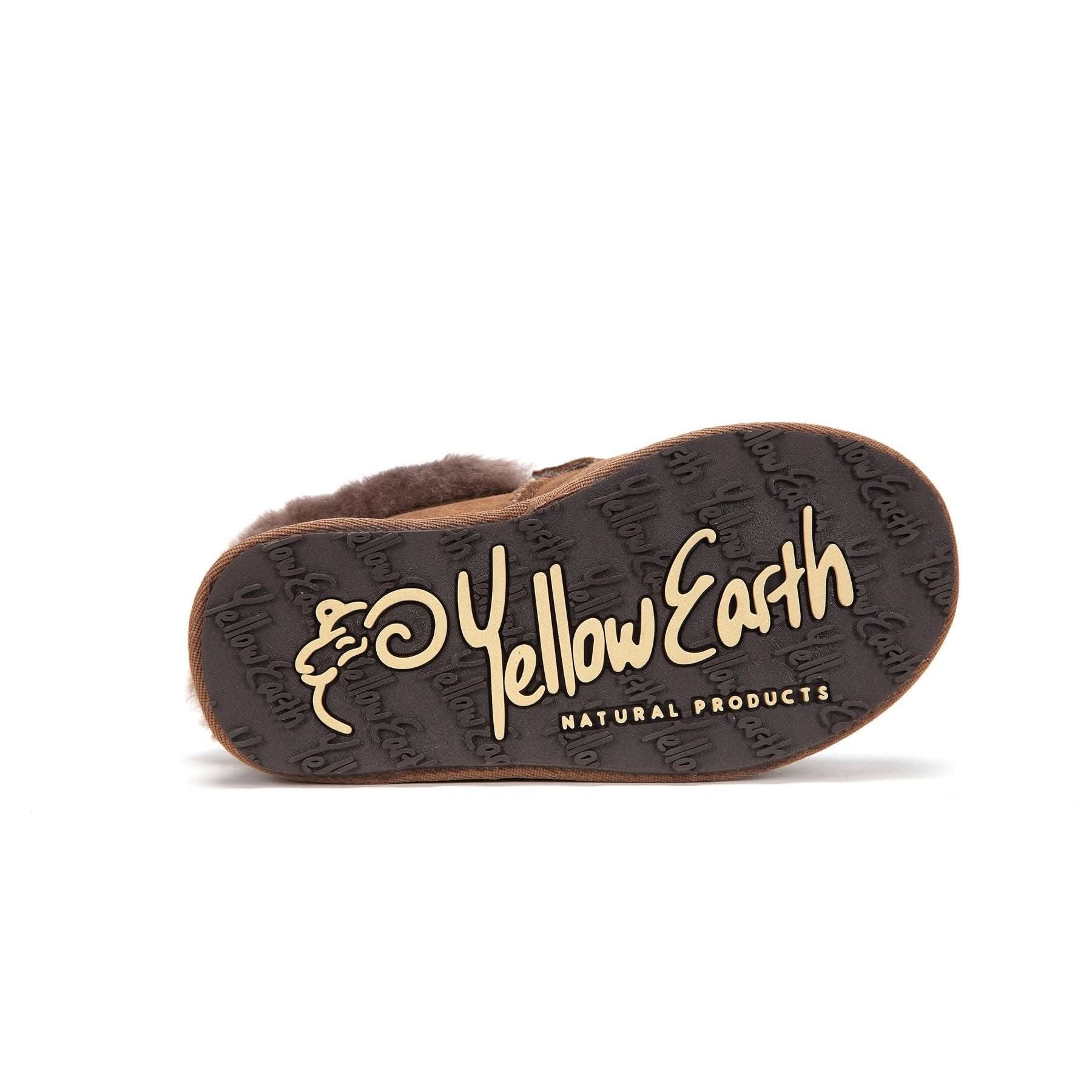 Brown sheepskin slipper with dark sole shown from underneath view. - Yellow Earth Australia
