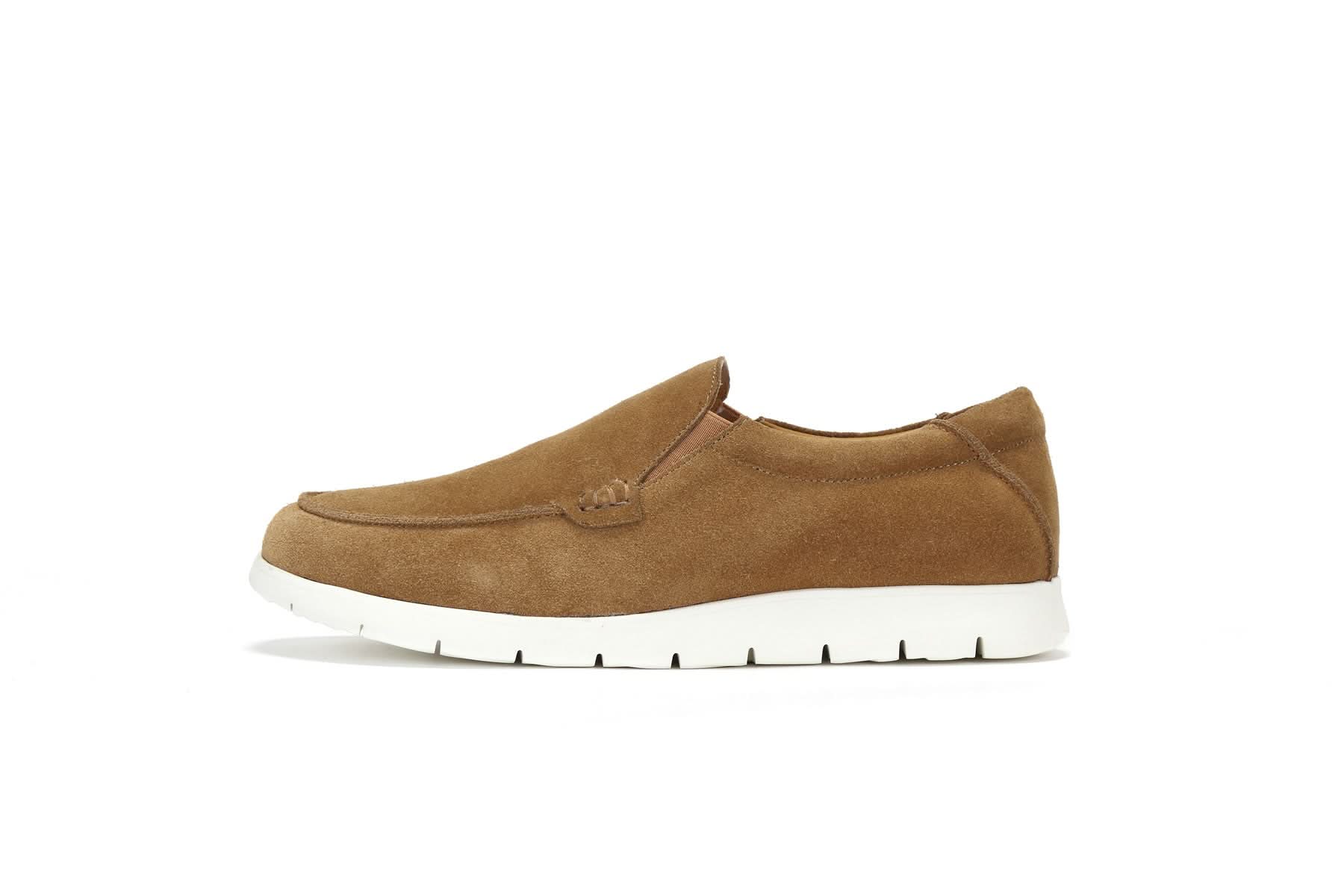 Tan suede slip-on loafer with white sole, side view. - Yellow Earth Australia