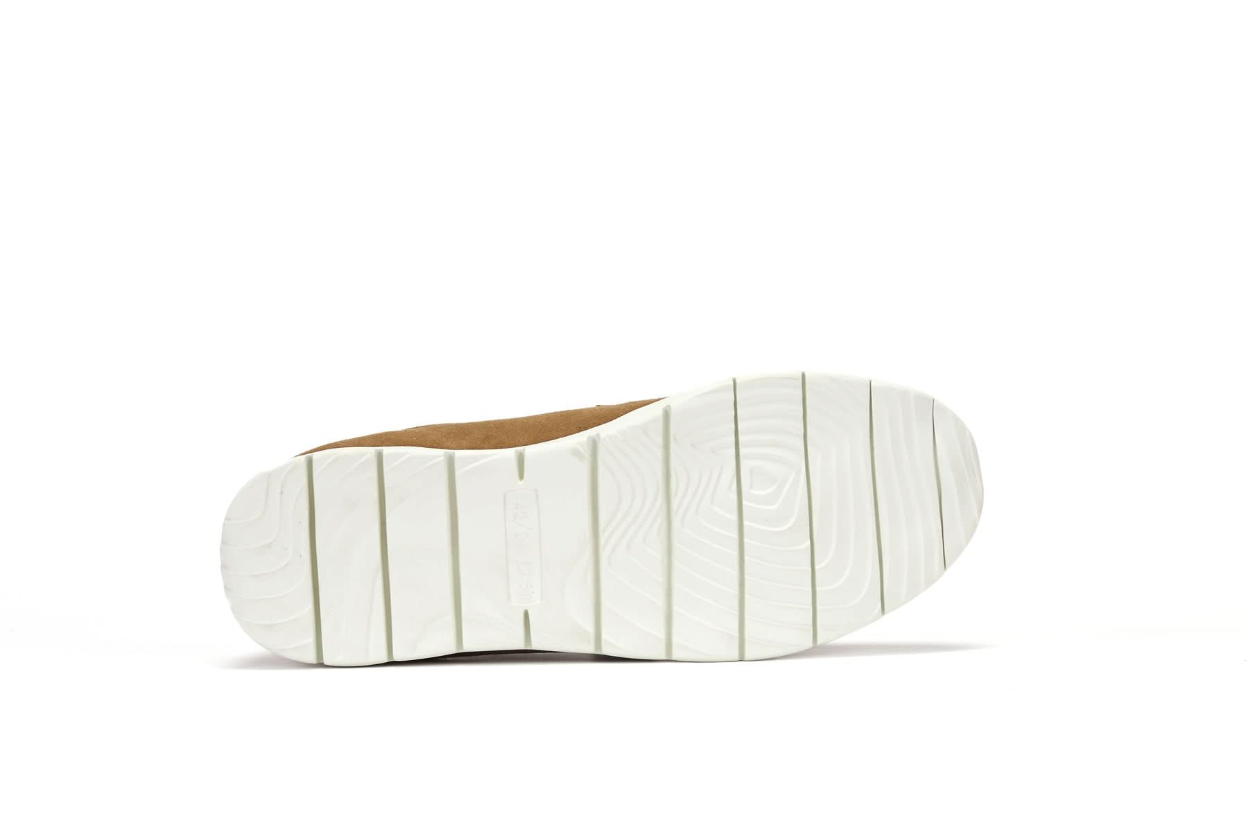 Cream leather and suede shoe sole viewed from underneath against white background. - Yellow Earth Australia
