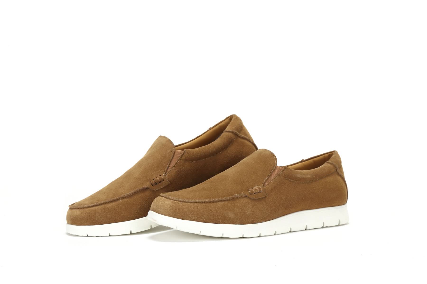 Tan suede slip-on loafers with white sole, shown from side angle view. - Yellow Earth Australia