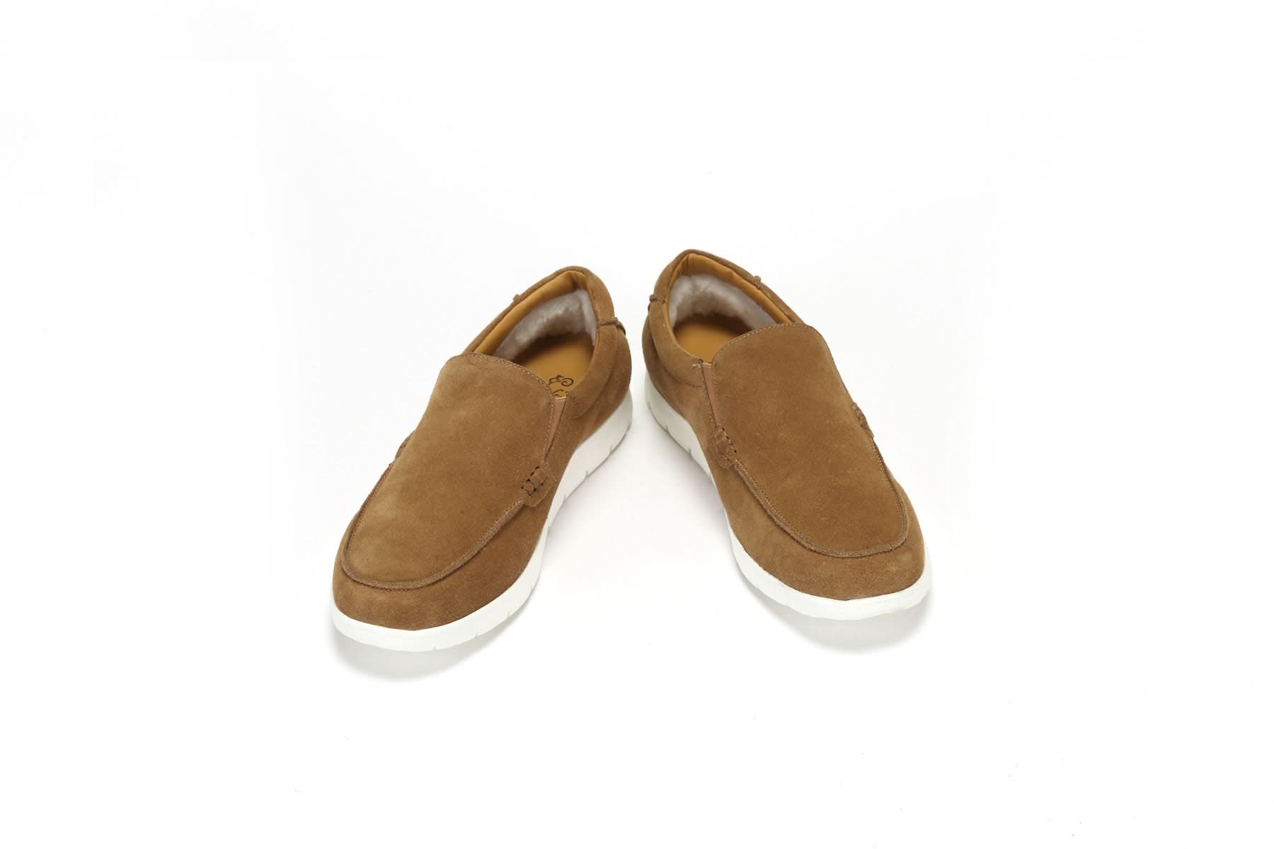 Tan suede slip-on loafers with white rubber sole, top view on white background. - Yellow Earth Australia