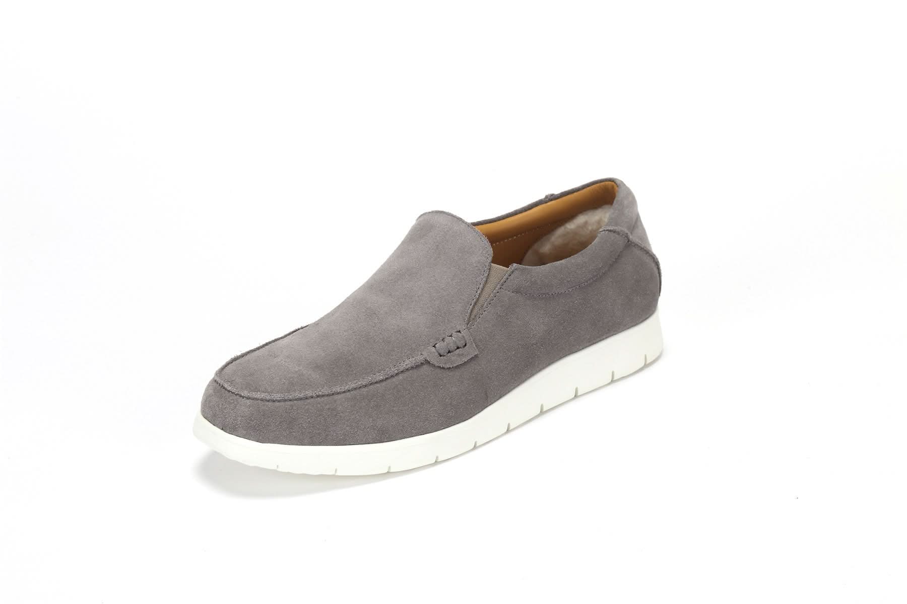 Grey suede sheepskin slip-on loafer with white sole, side view. - Yellow Earth Australia