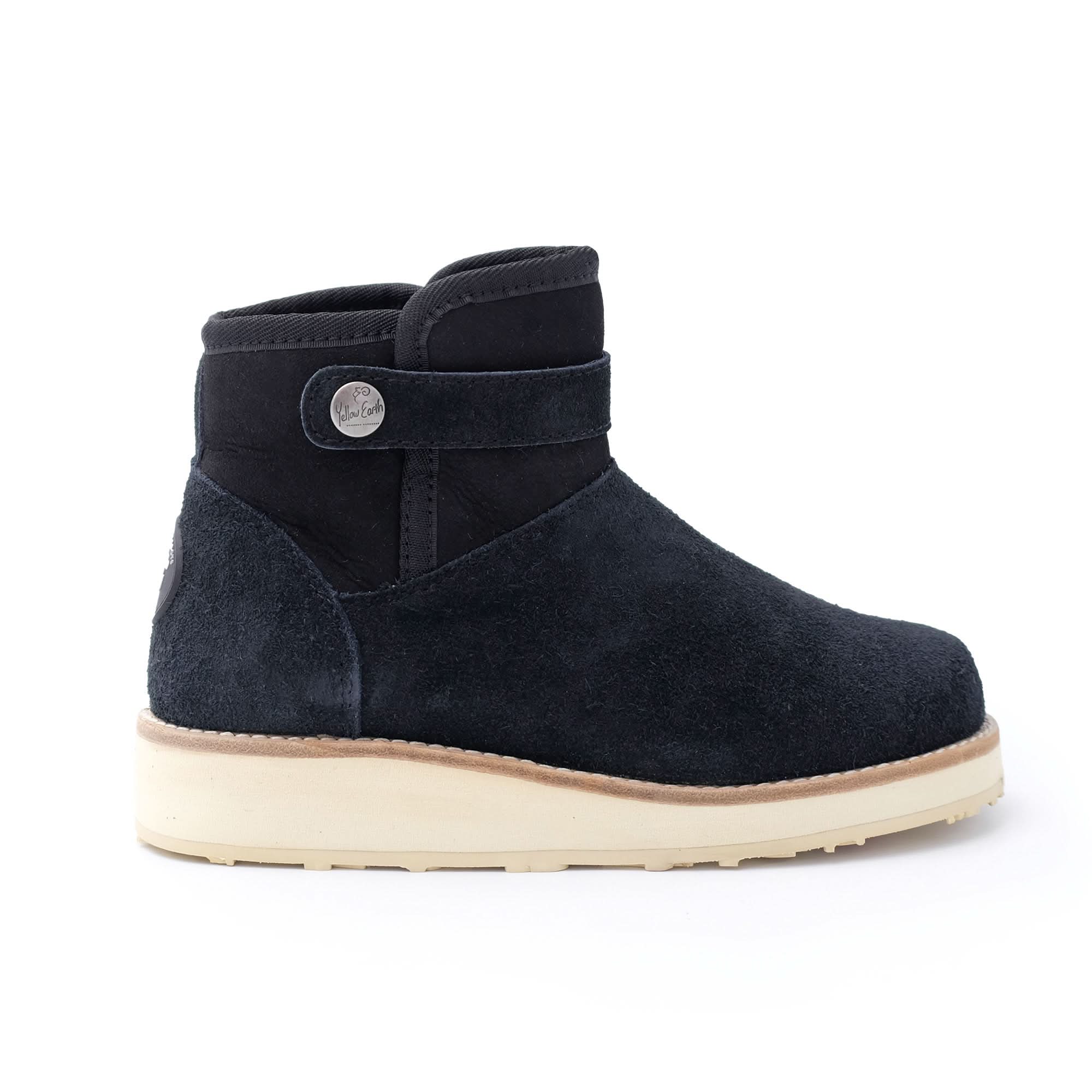 Black suede sheepskin ankle boot with cream sole, side view. - Yellow Earth Australia