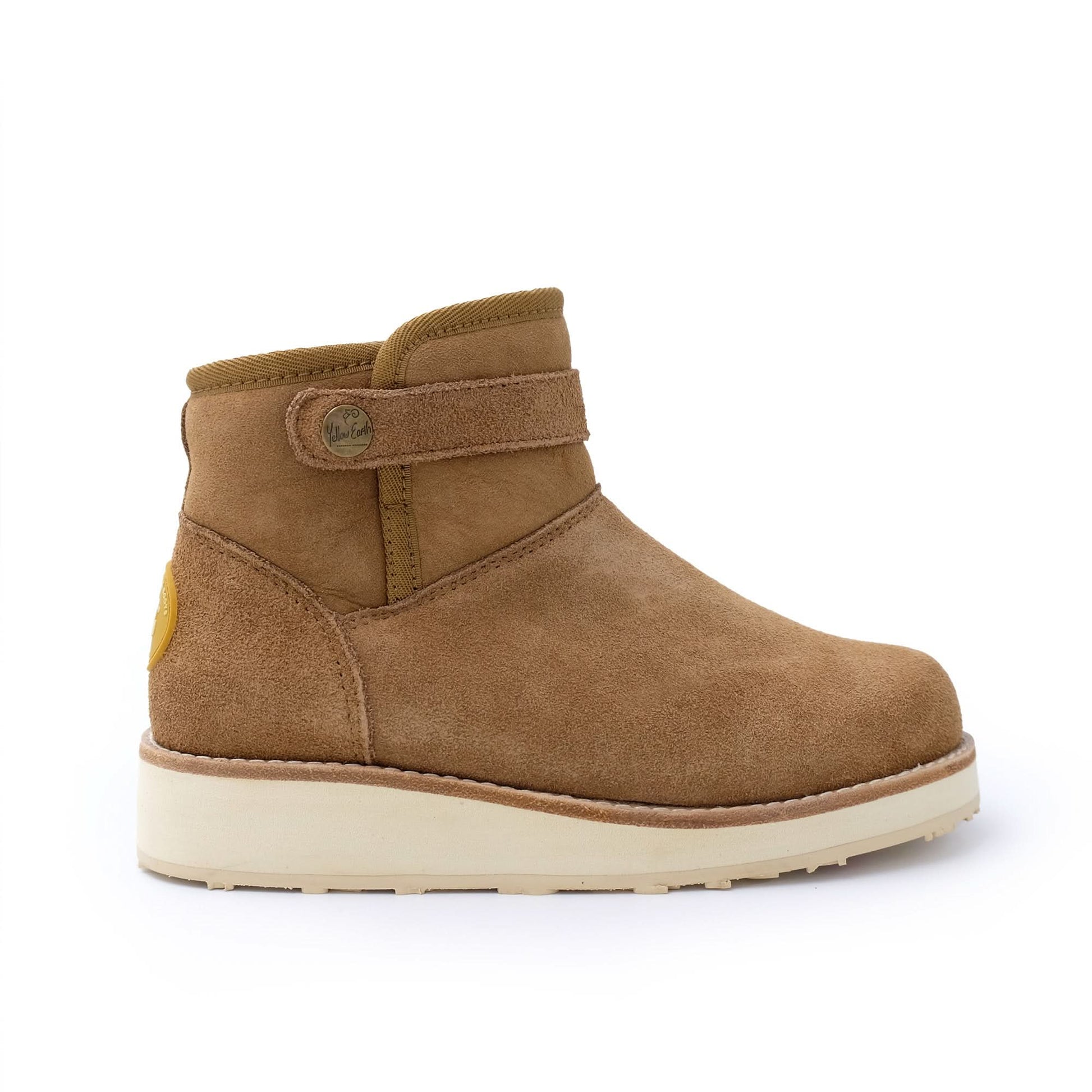 Tan suede sheepskin ankle boot with cream sole, side view. - Yellow Earth Australia