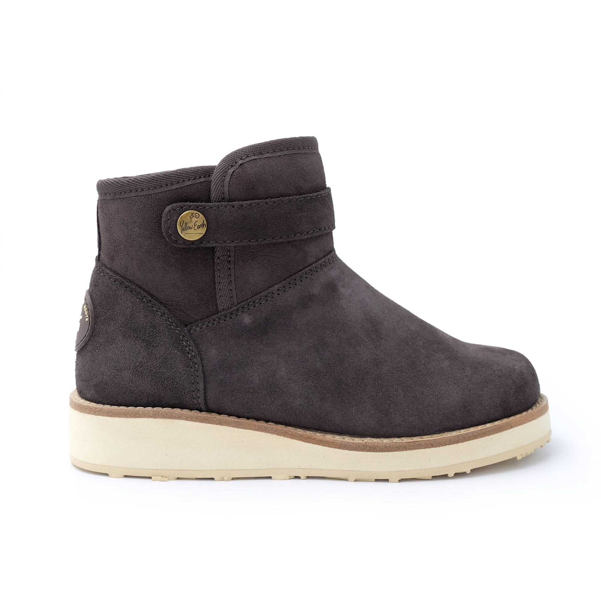Black suede ankle boot with cream sole, side view. - Yellow Earth Australia