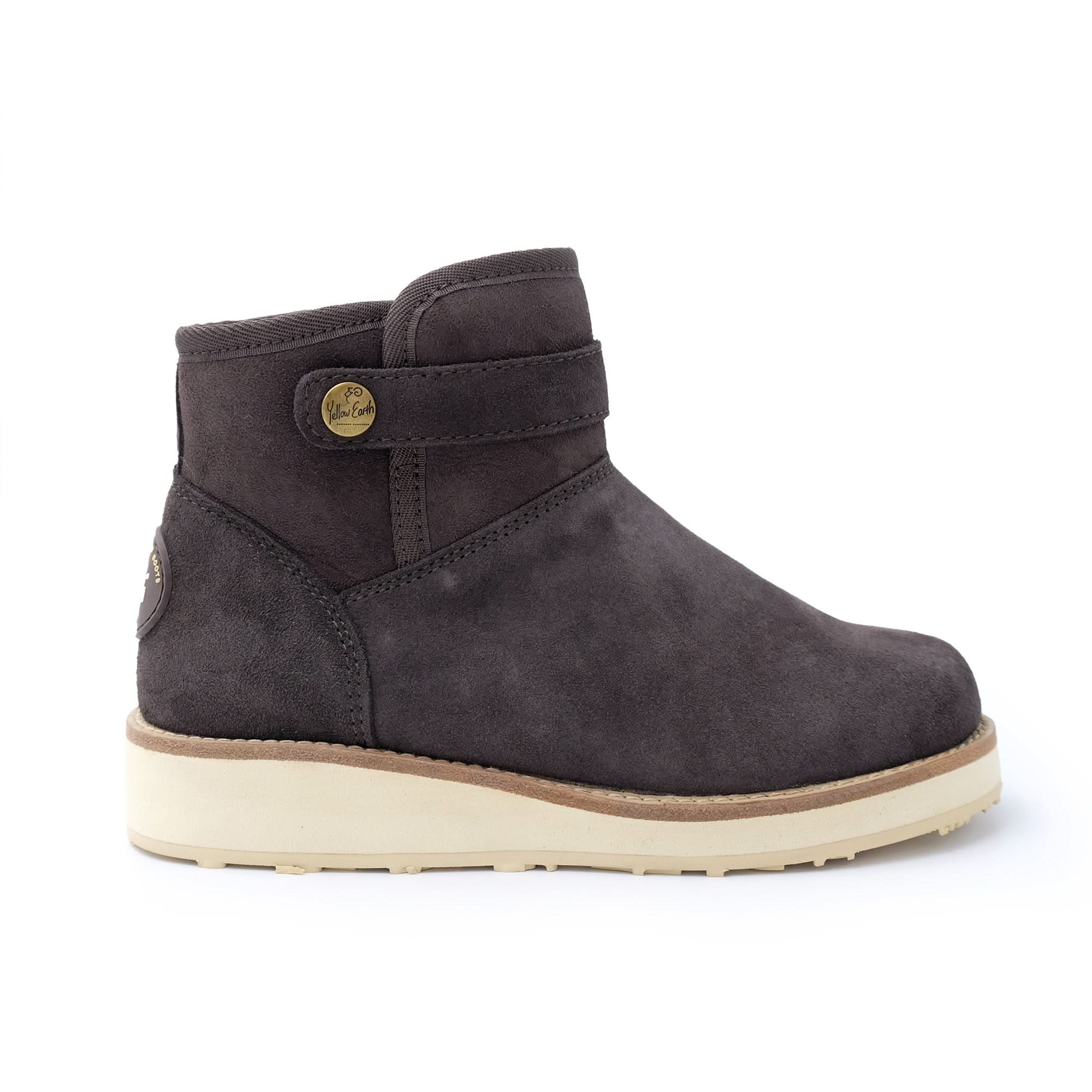 Black suede ankle boot with cream sole, side view. - Yellow Earth Australia