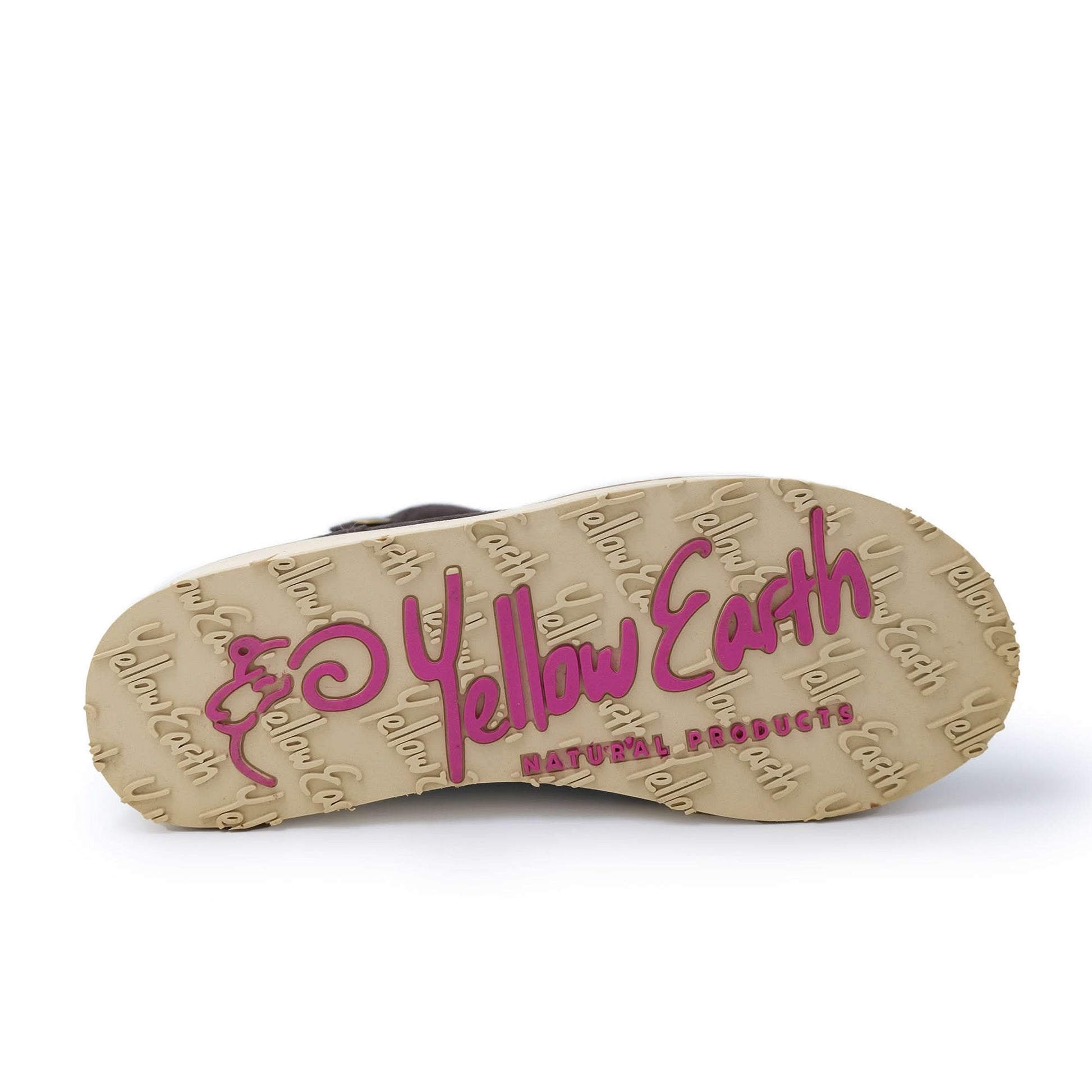 Beige sheepskin boot sole with magenta text, bottom view showing textured natural rubber grip. - Yellow Earth Australia