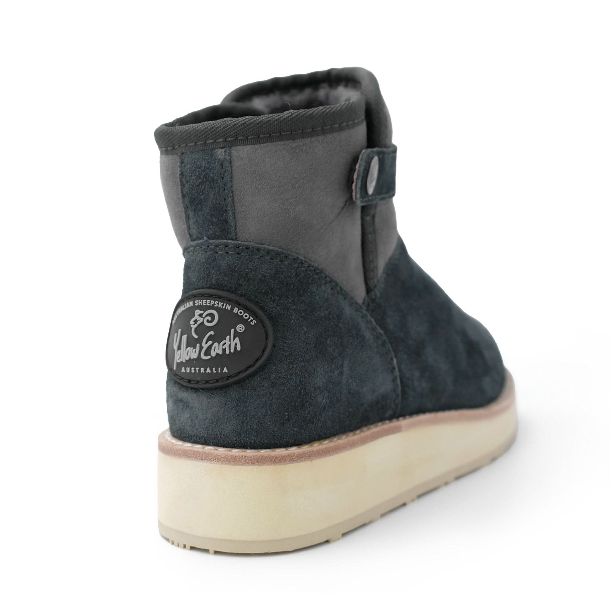 Charcoal sheepskin ankle boot with cream sole, rear three-quarter view. - Yellow Earth Australia