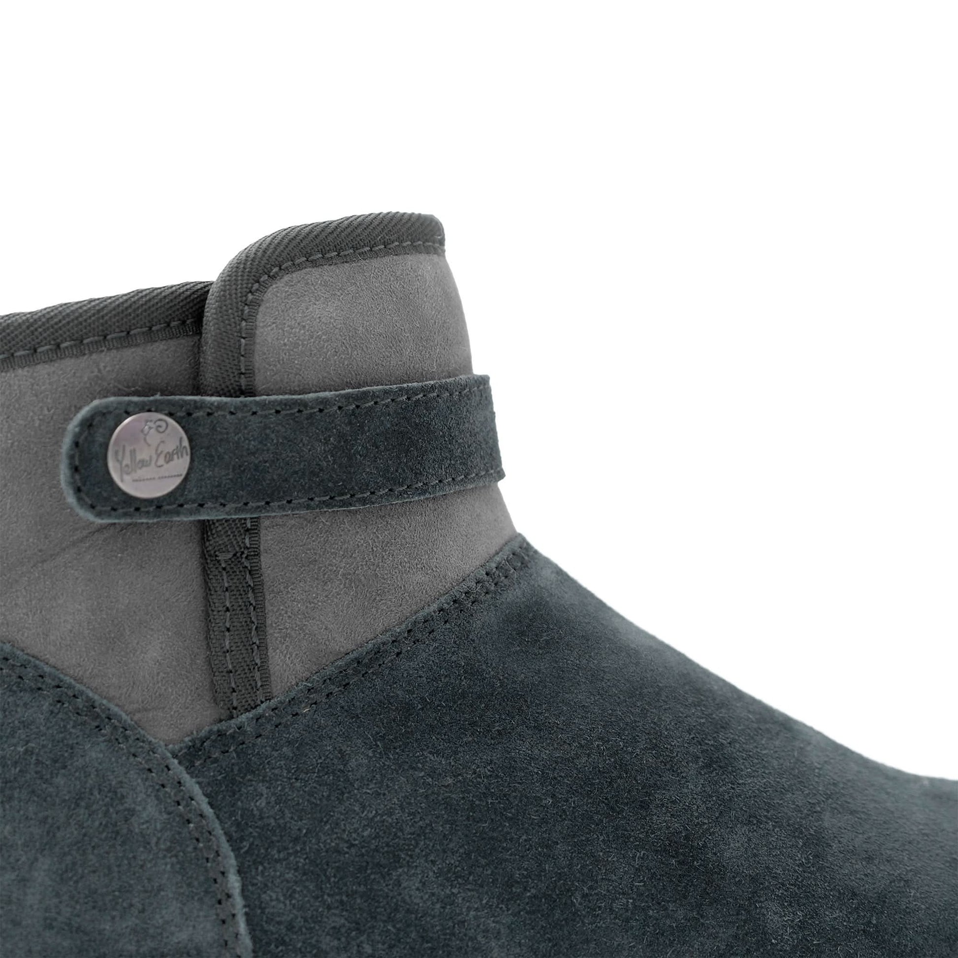 Grey suede sheepskin ankle boot with wool lining, side view with adjustable strap detail. - Yellow Earth Australia