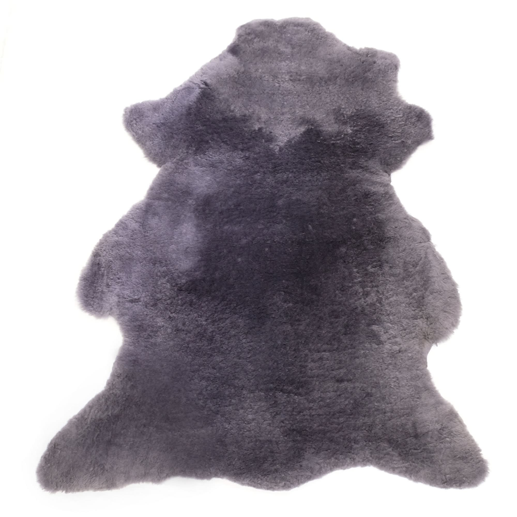 Gray sheepskin rug with soft wool fleece shown from above on white background. - Yellow Earth Australia