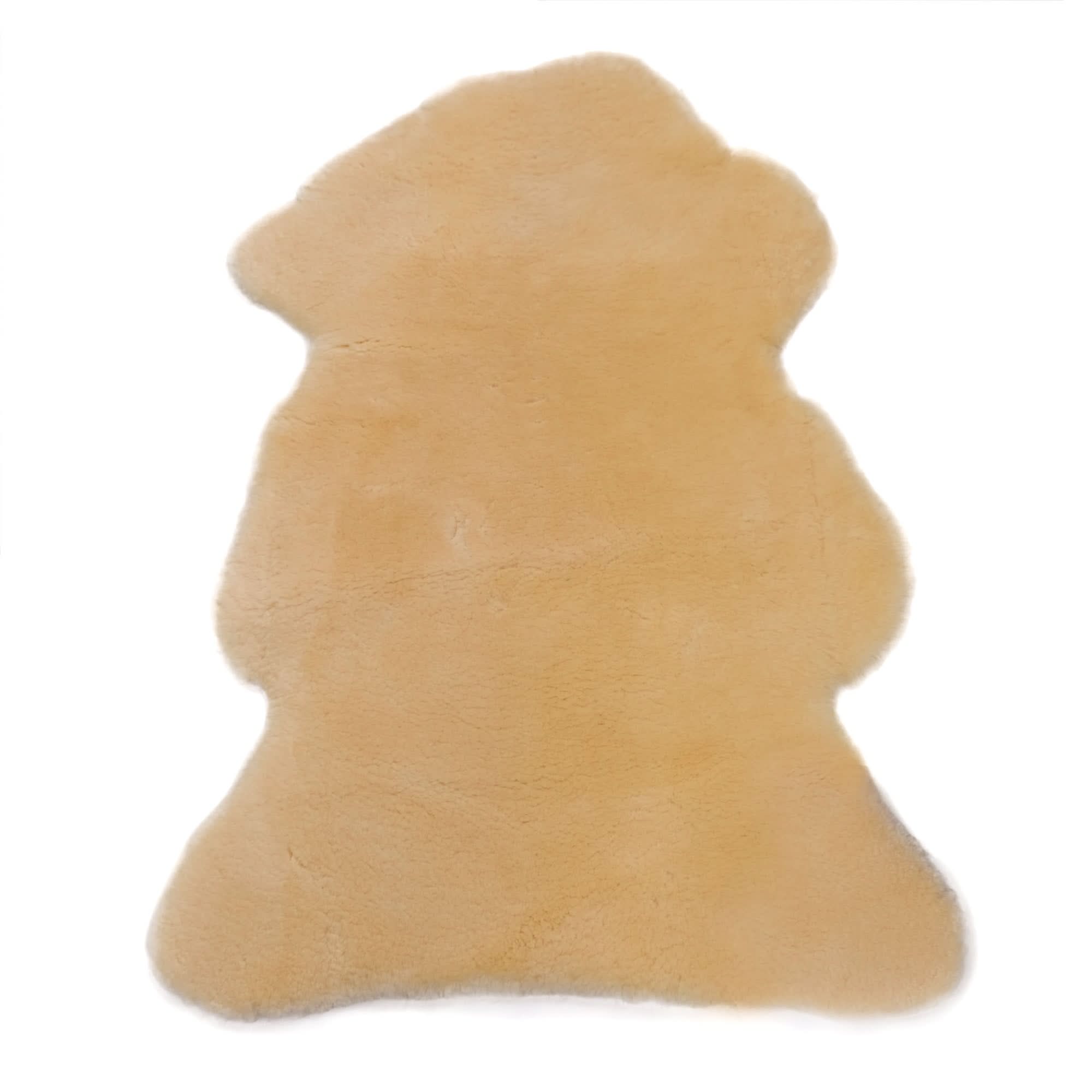 Cream sheepskin rug with soft wool pile viewed from above on white background. - Yellow Earth Australia