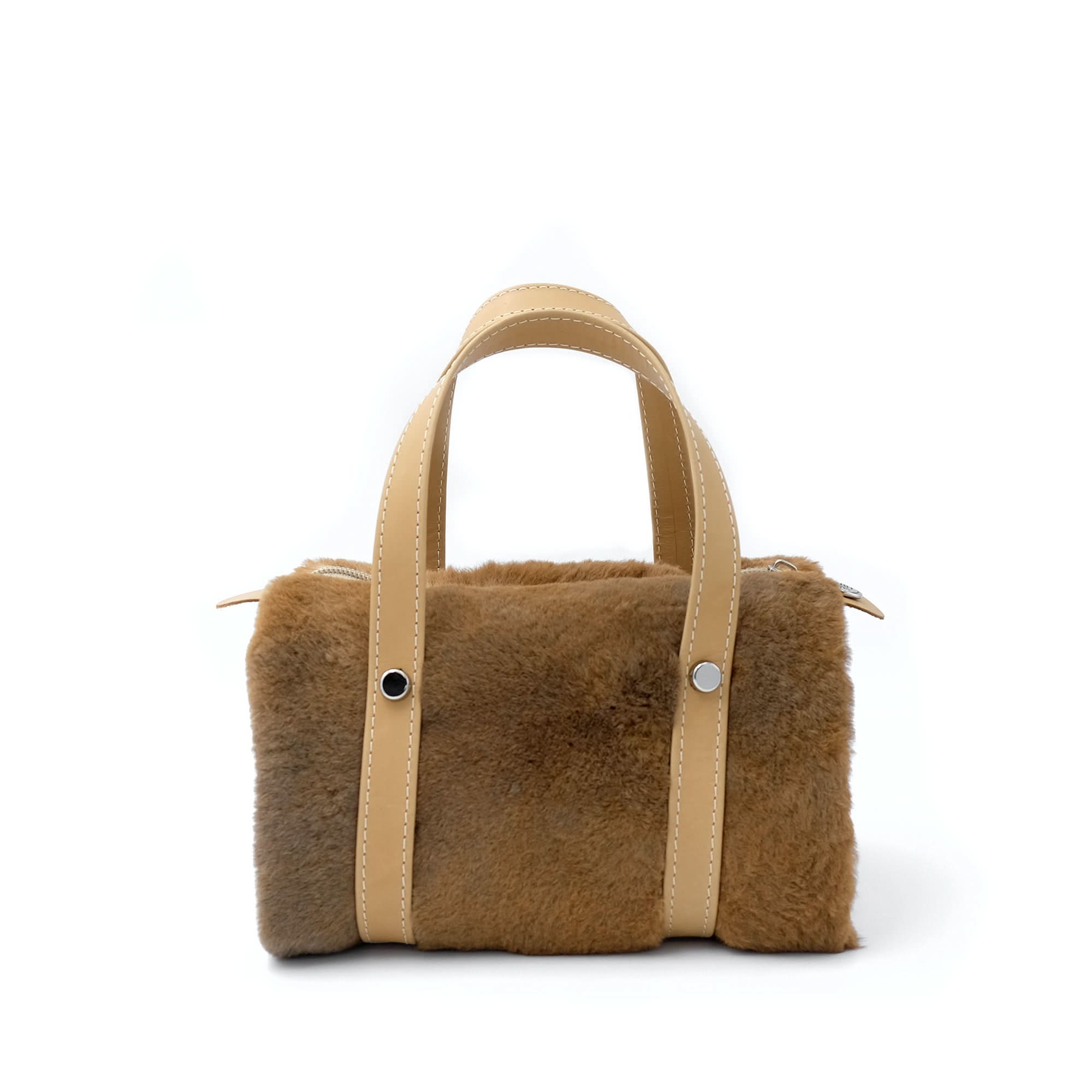 Caramel fluffy sheepskin handbag with tan leather handles, front view. - Yellow Earth Australia