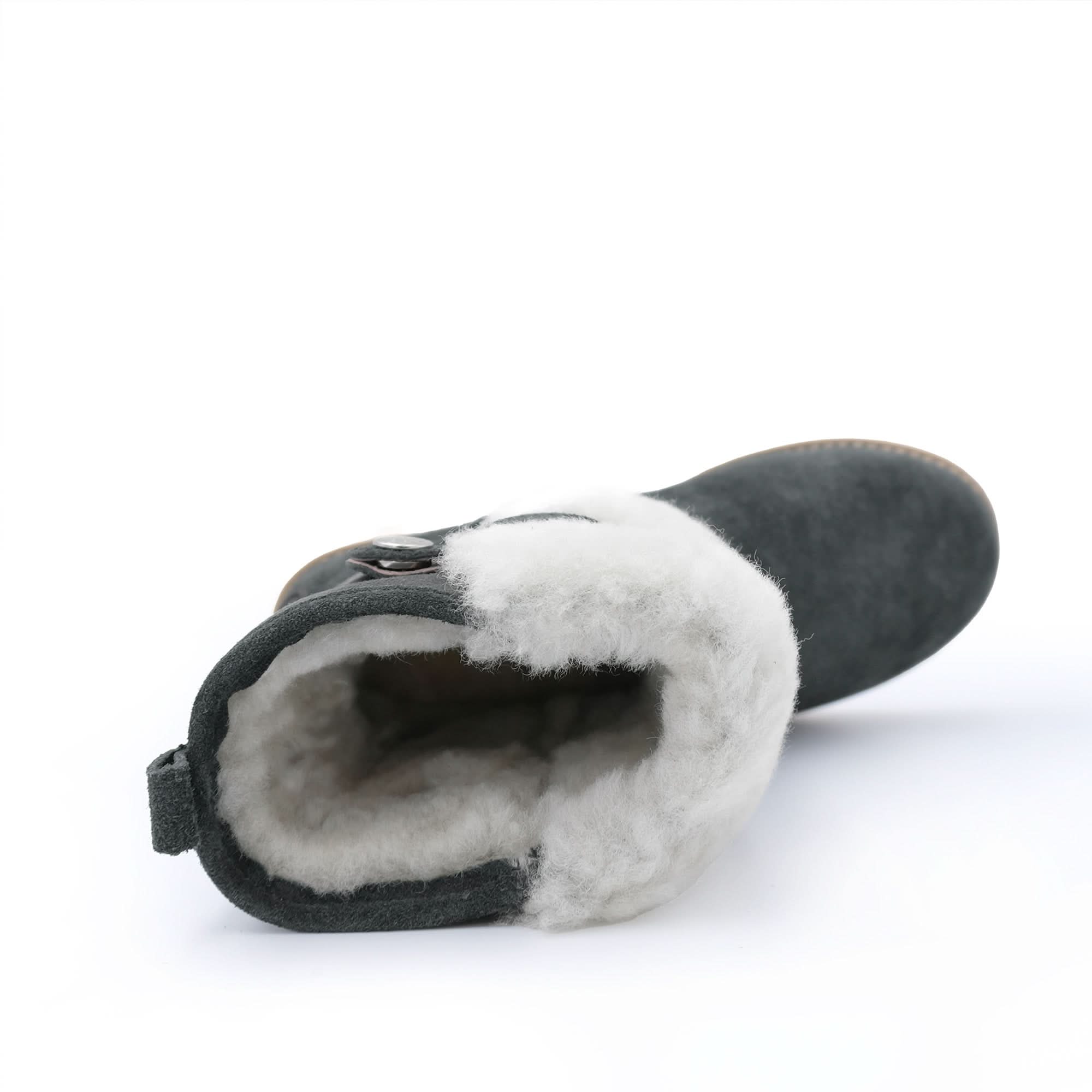 Gunmetal grey sheepskin UGG boot with plush white wool lining, top view on white background