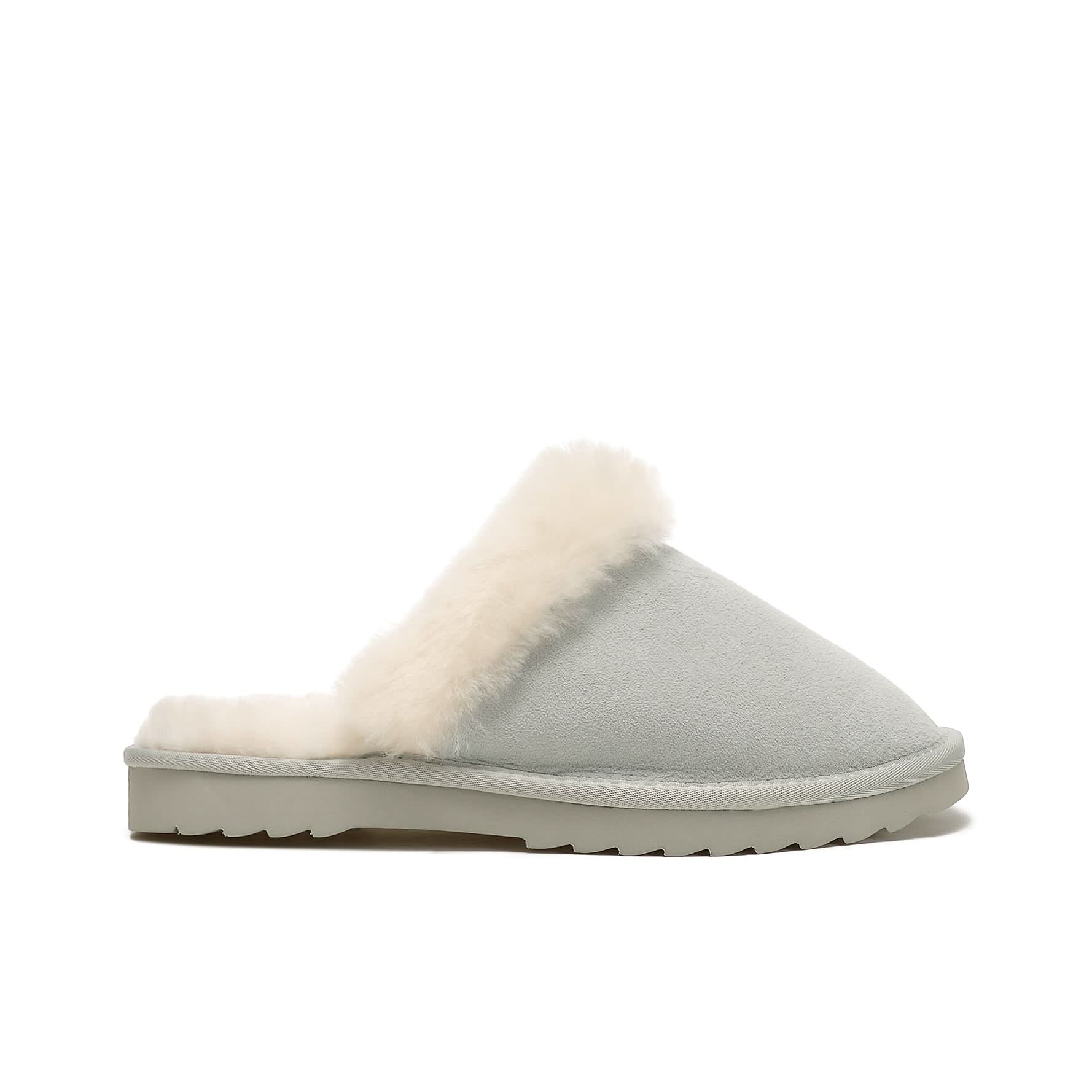 Cream sheepskin slipper mule with fluffy wool lining, side view. - Yellow Earth Australia