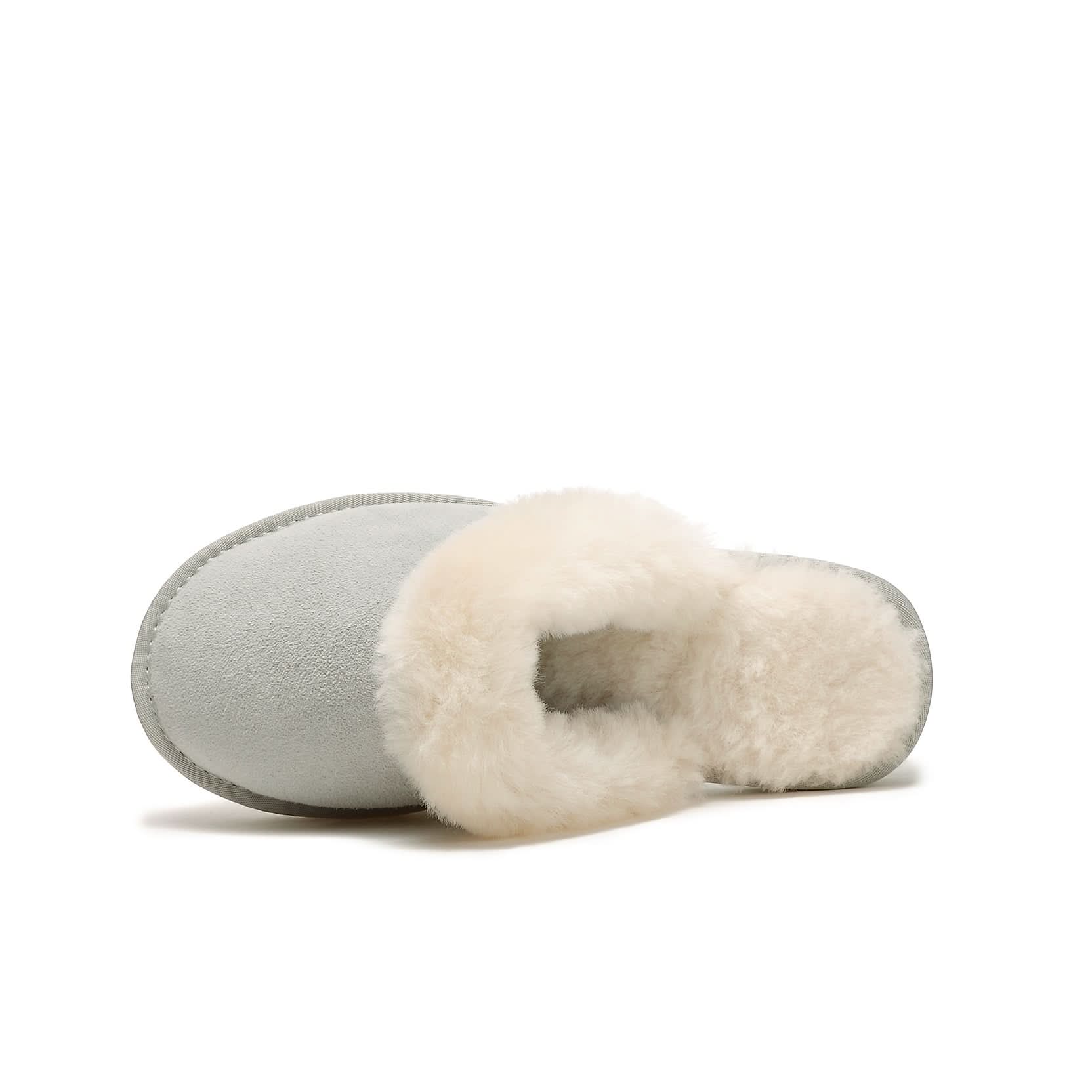 Cream sheepskin slipper with fluffy wool lining, side view on white background. - Yellow Earth Australia