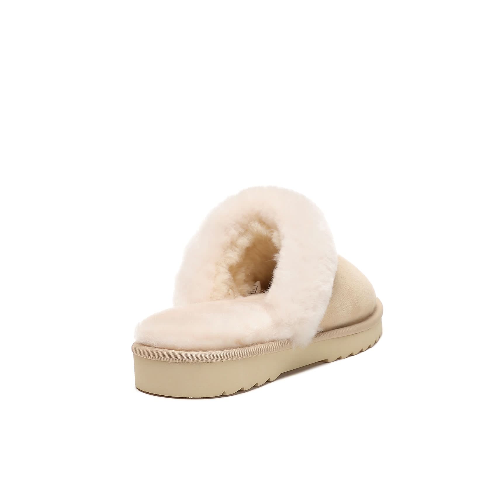 Cream sheepskin slipper with wool lining shown from the back angle. - Yellow Earth Australia