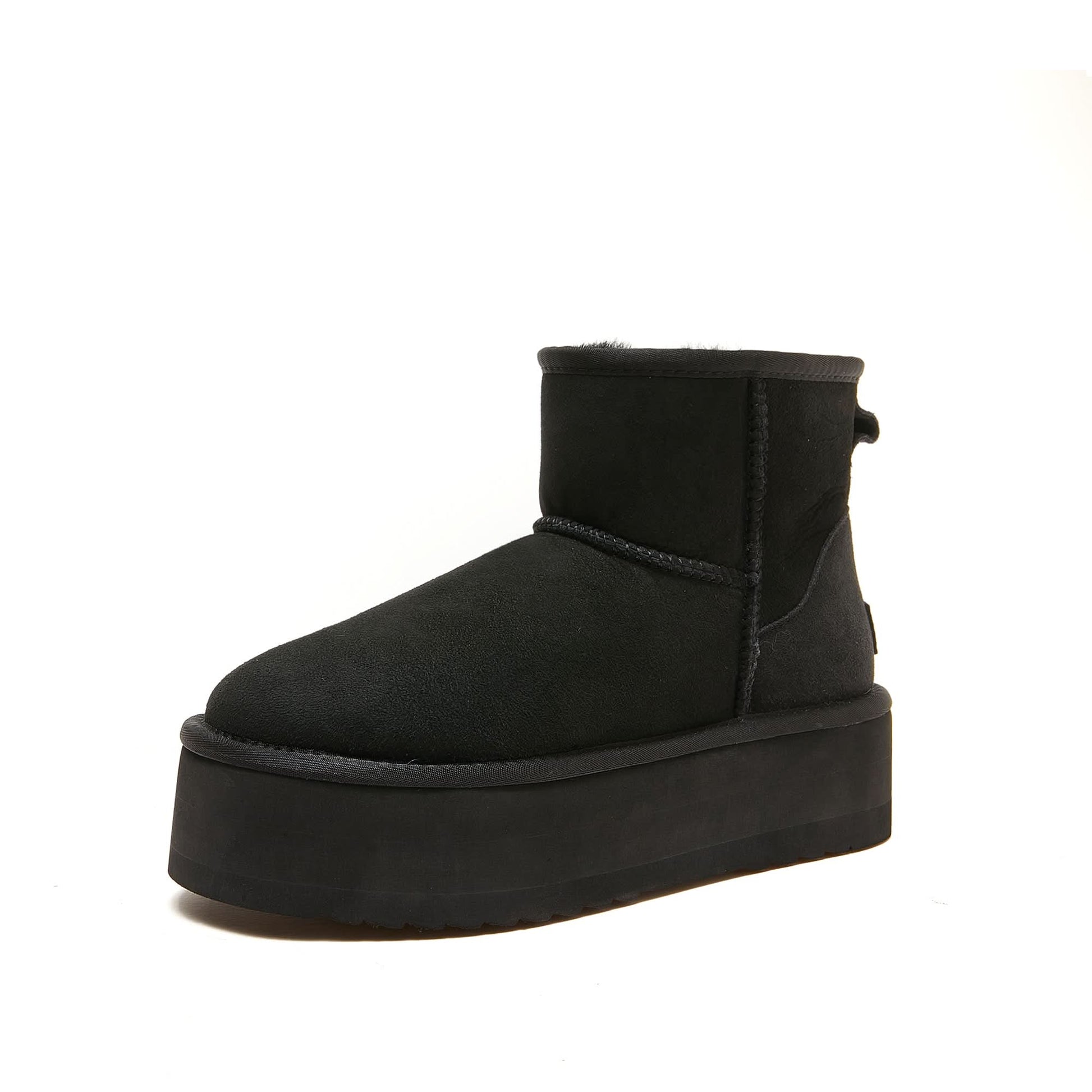 Black sheepskin platform ankle boot with fur lining, side view. - Yellow Earth Australia