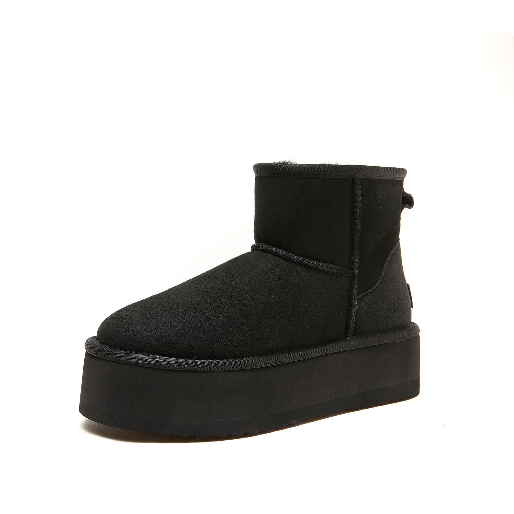 Black sheepskin platform ankle boot with fur lining, side view. - Yellow Earth Australia