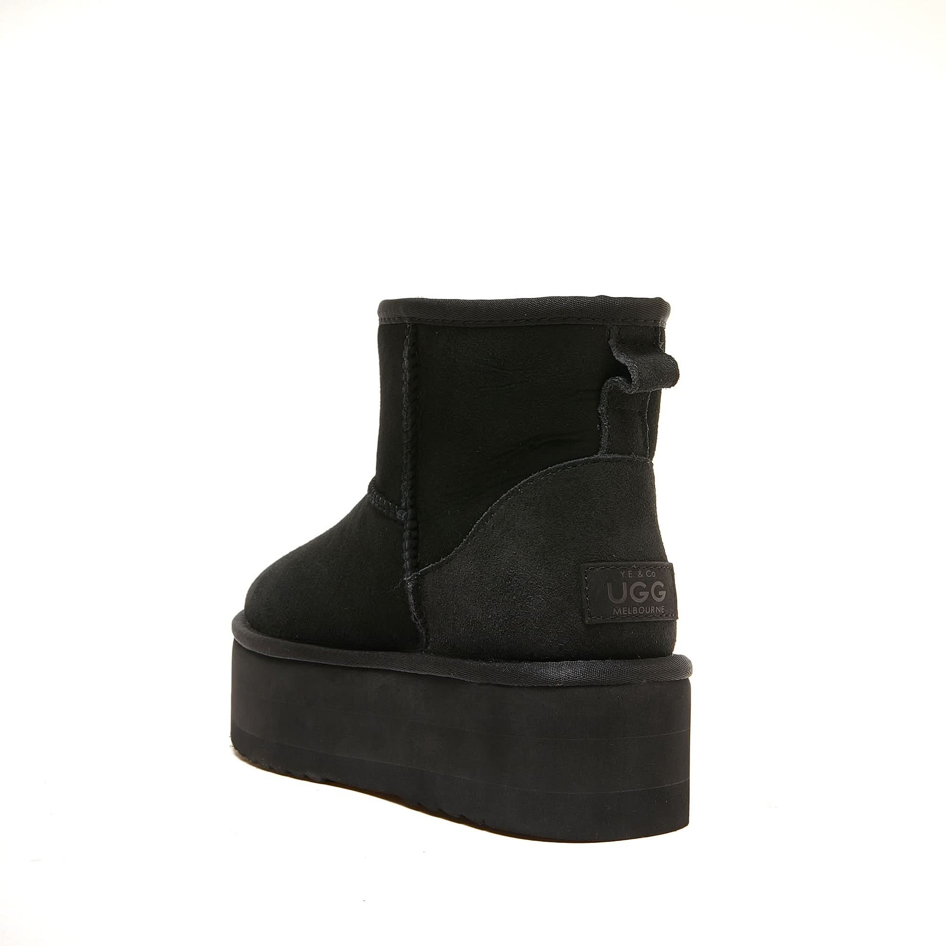 Black suede platform ankle boot with sheepskin lining, rear view. - Yellow Earth Australia