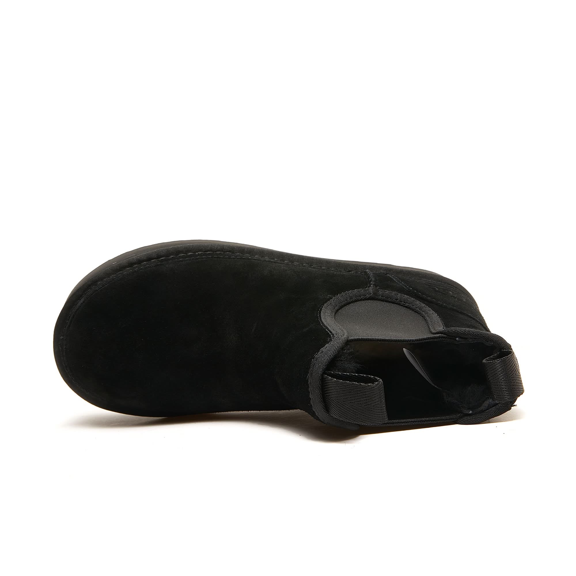 Black suede sheepskin ankle boot with pull tab, side view. - Yellow Earth Australia