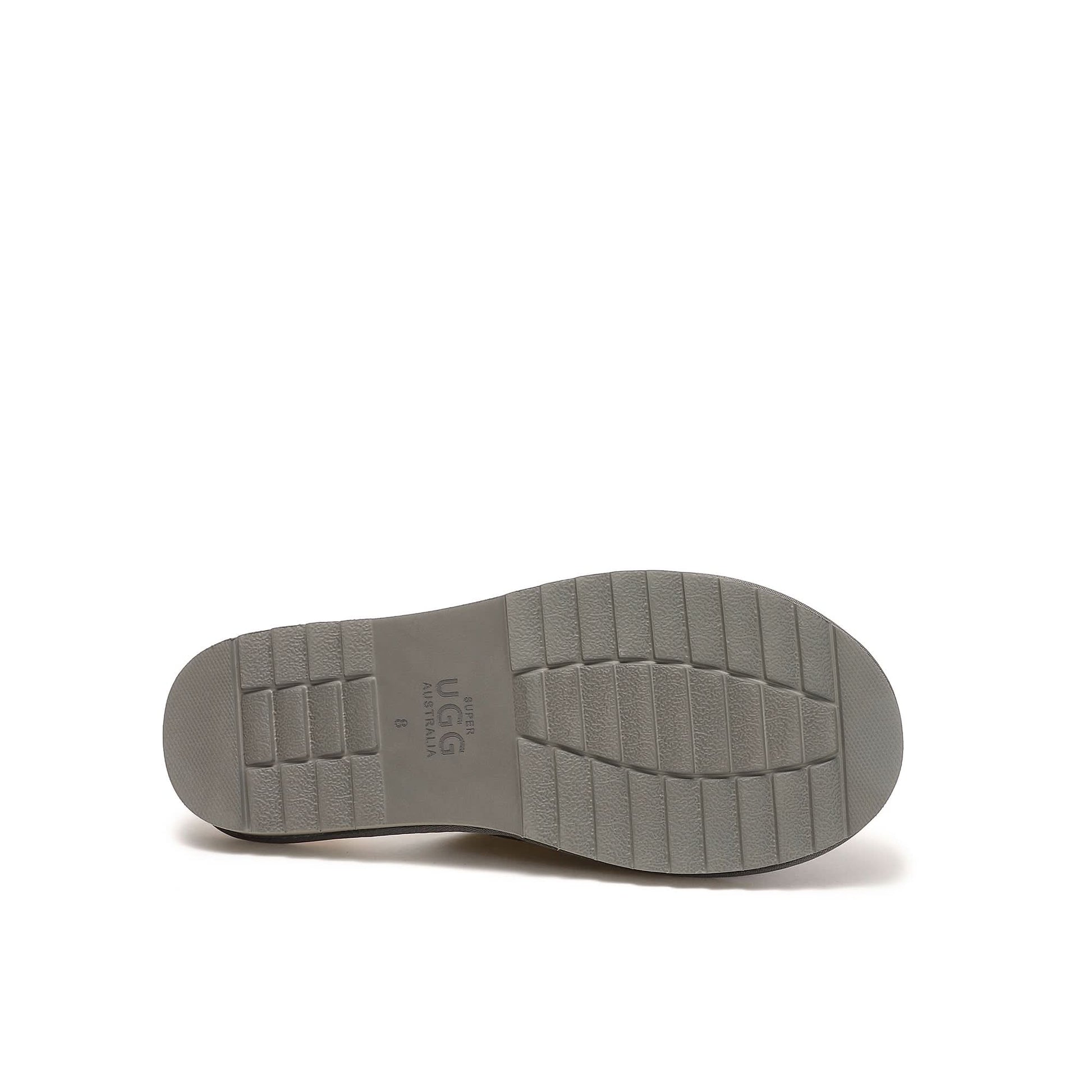 Beige sheepskin slip-on shoe sole with textured grip pattern, bottom view. - Yellow Earth Australia