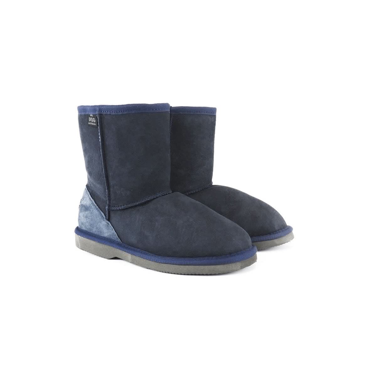 Navy blue sheepskin boots with grey sole and blue heel trim, displayed from the front angle. - Yellow Earth Australia