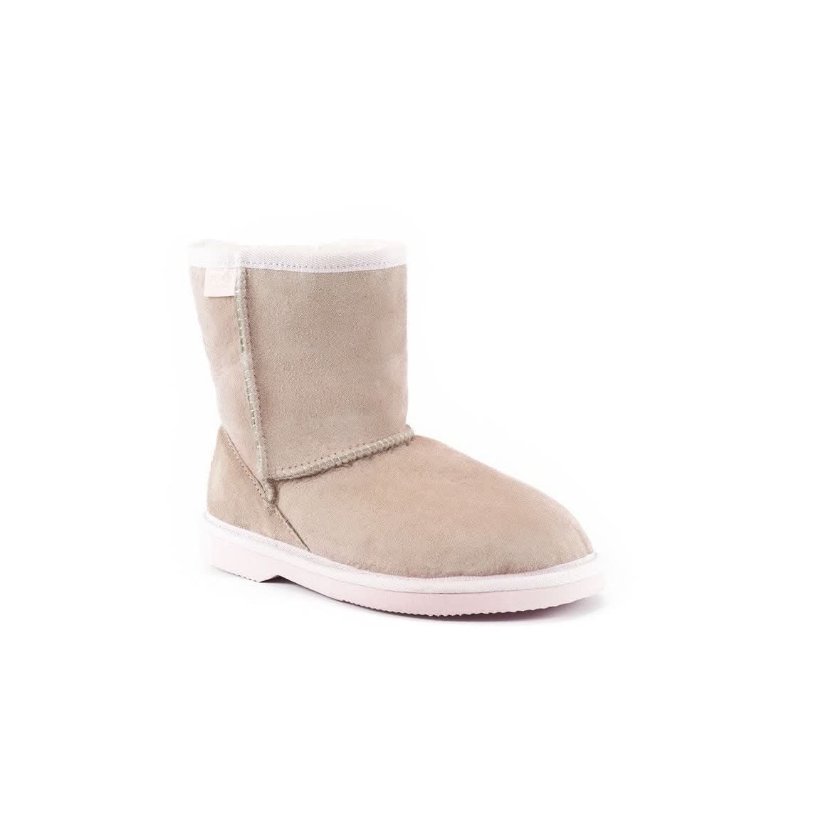 Beige sheepskin boot with white sole, side view against white background. - Yellow Earth Australia
