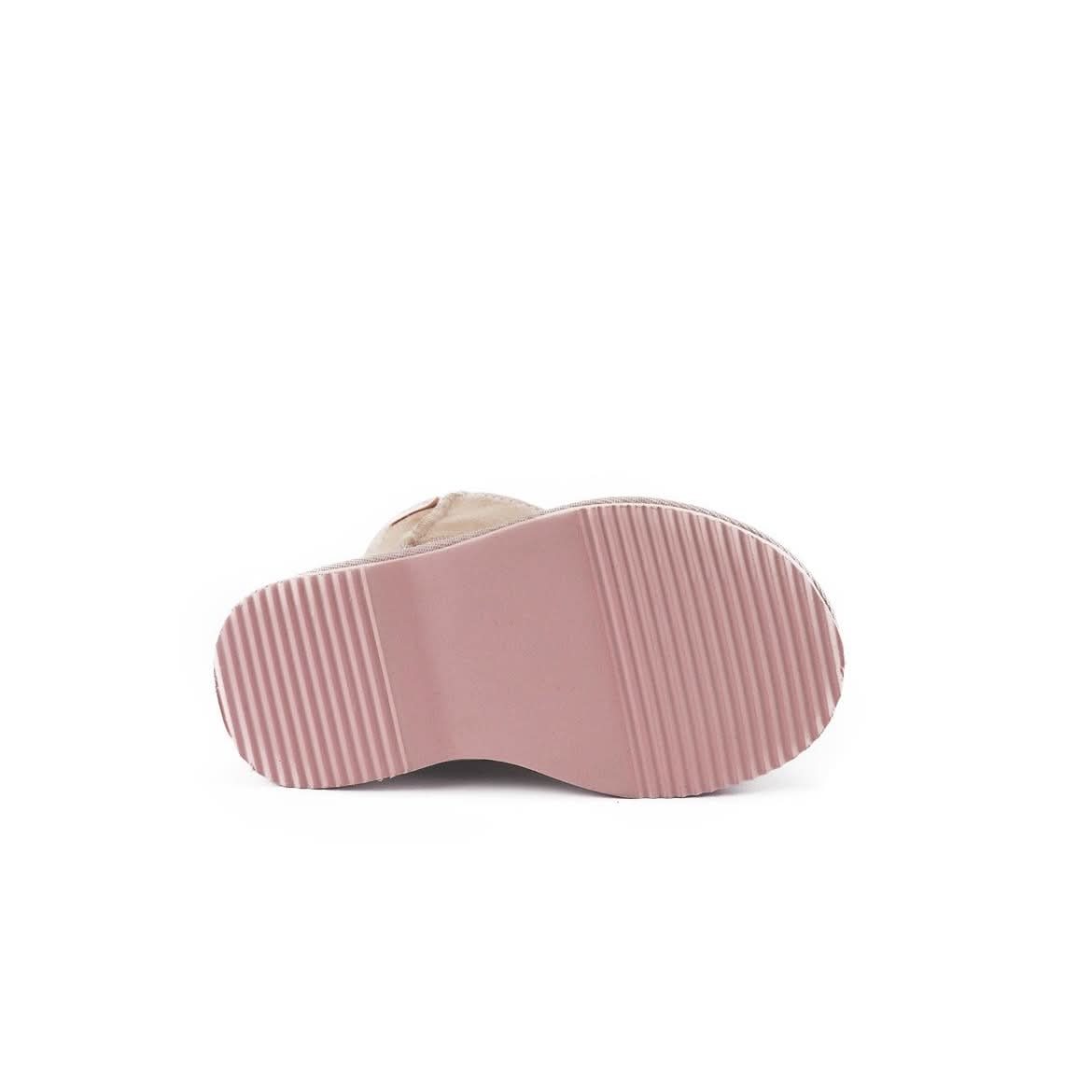 Beige sheepskin boot sole view showing pink ribbed rubber outsole and wool lining. - Yellow Earth Australia