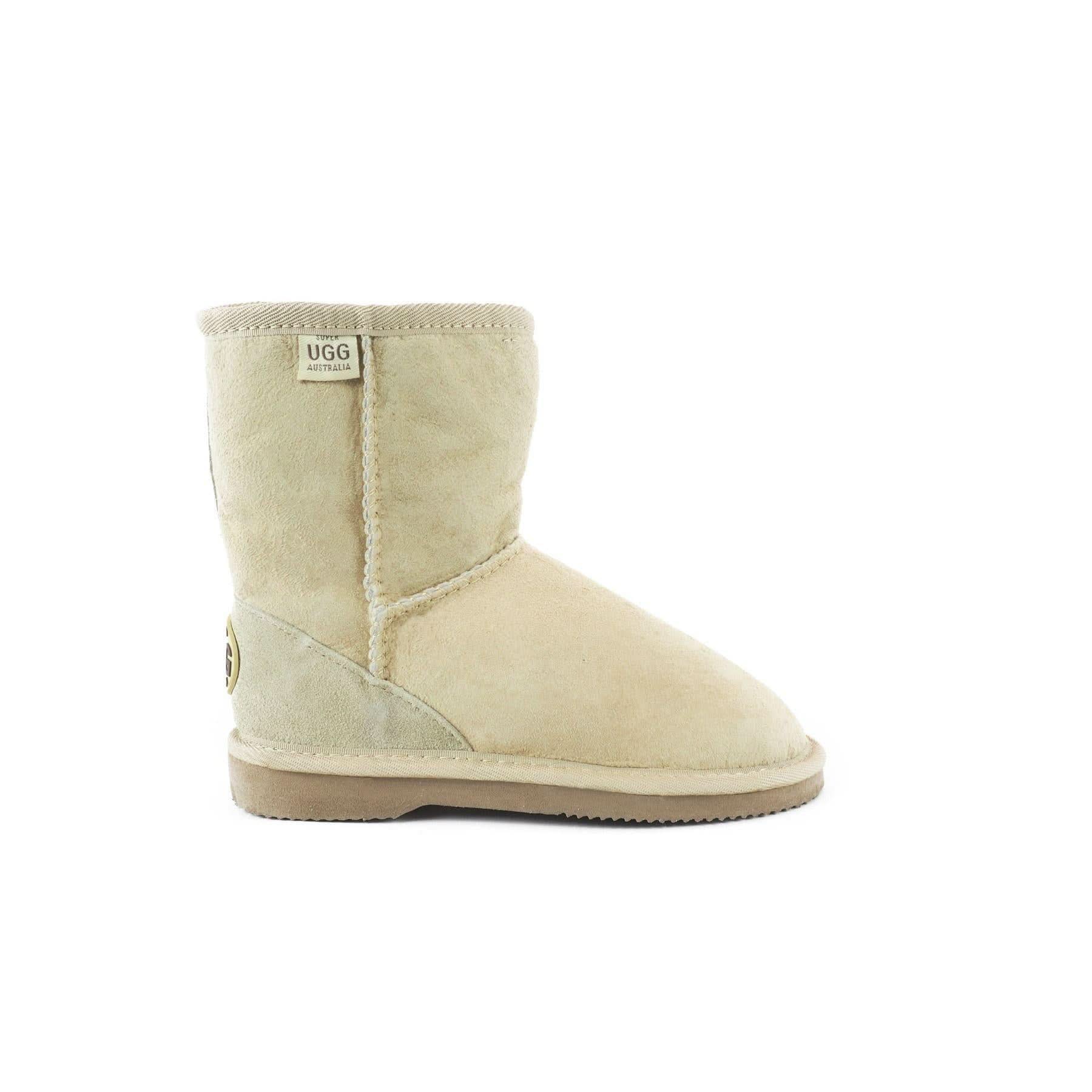 Cream sheepskin boot with fleece lining, side view against white background. - Yellow Earth Australia