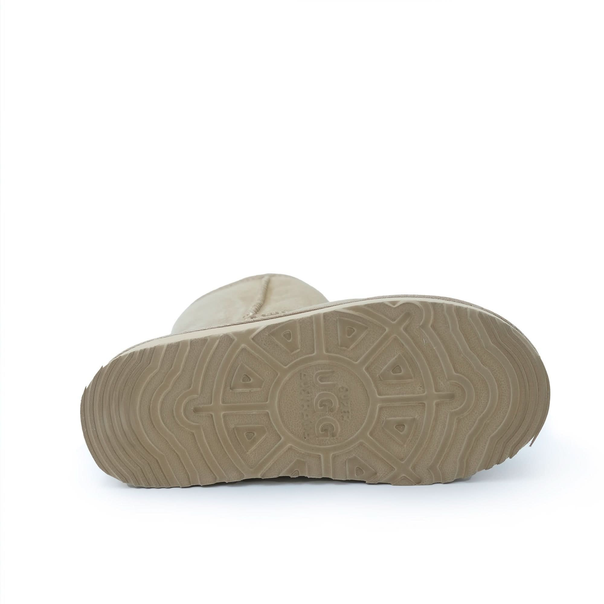 Beige sheepskin boot sole view showing geometric tread pattern. - Yellow Earth Australia